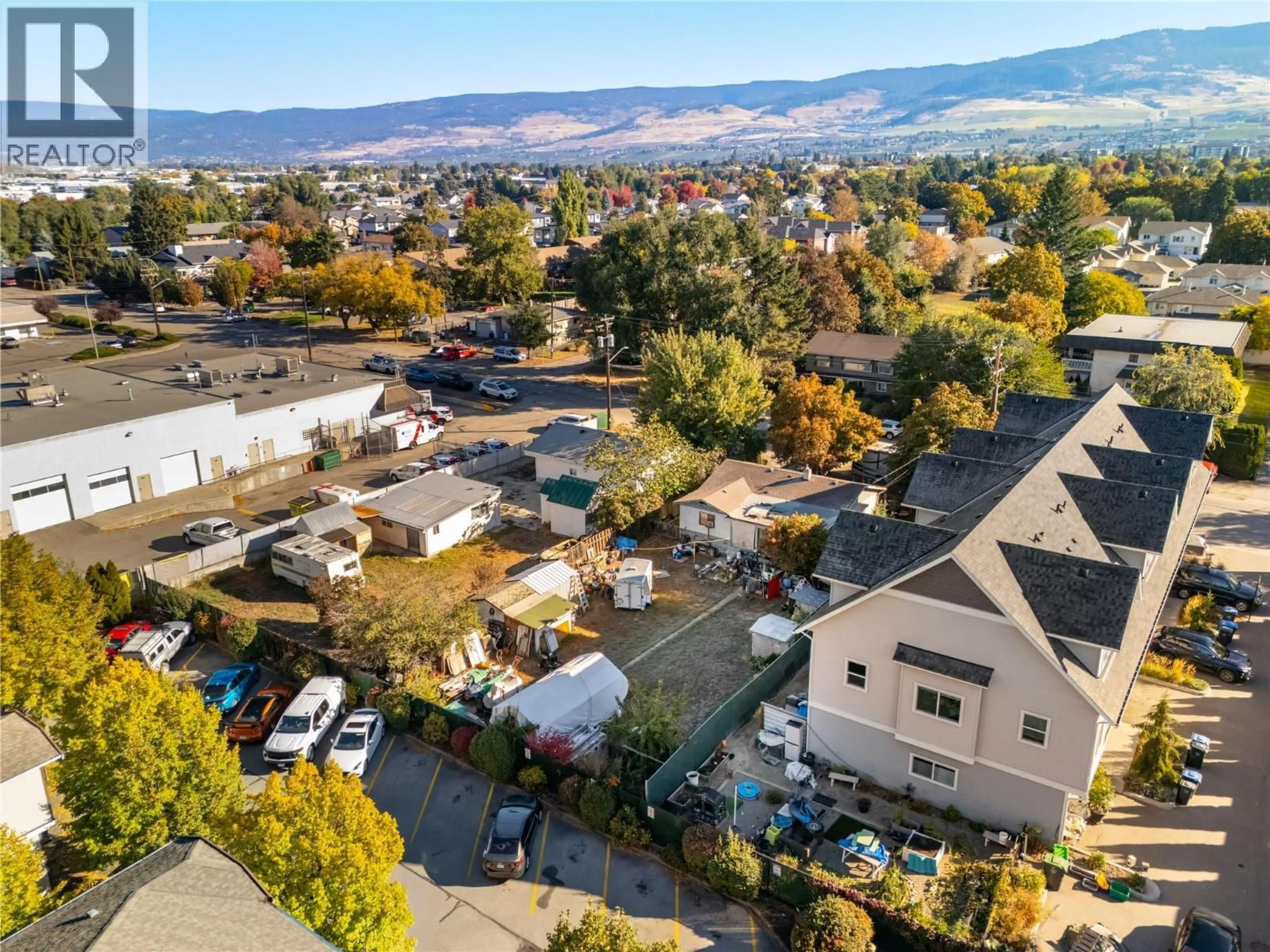 A pic from outside/outdoor area/front of a property/back of a property/a pic from drone, mountain view for 150 MILLS ROAD, Kelowna British Columbia V1X4G7
