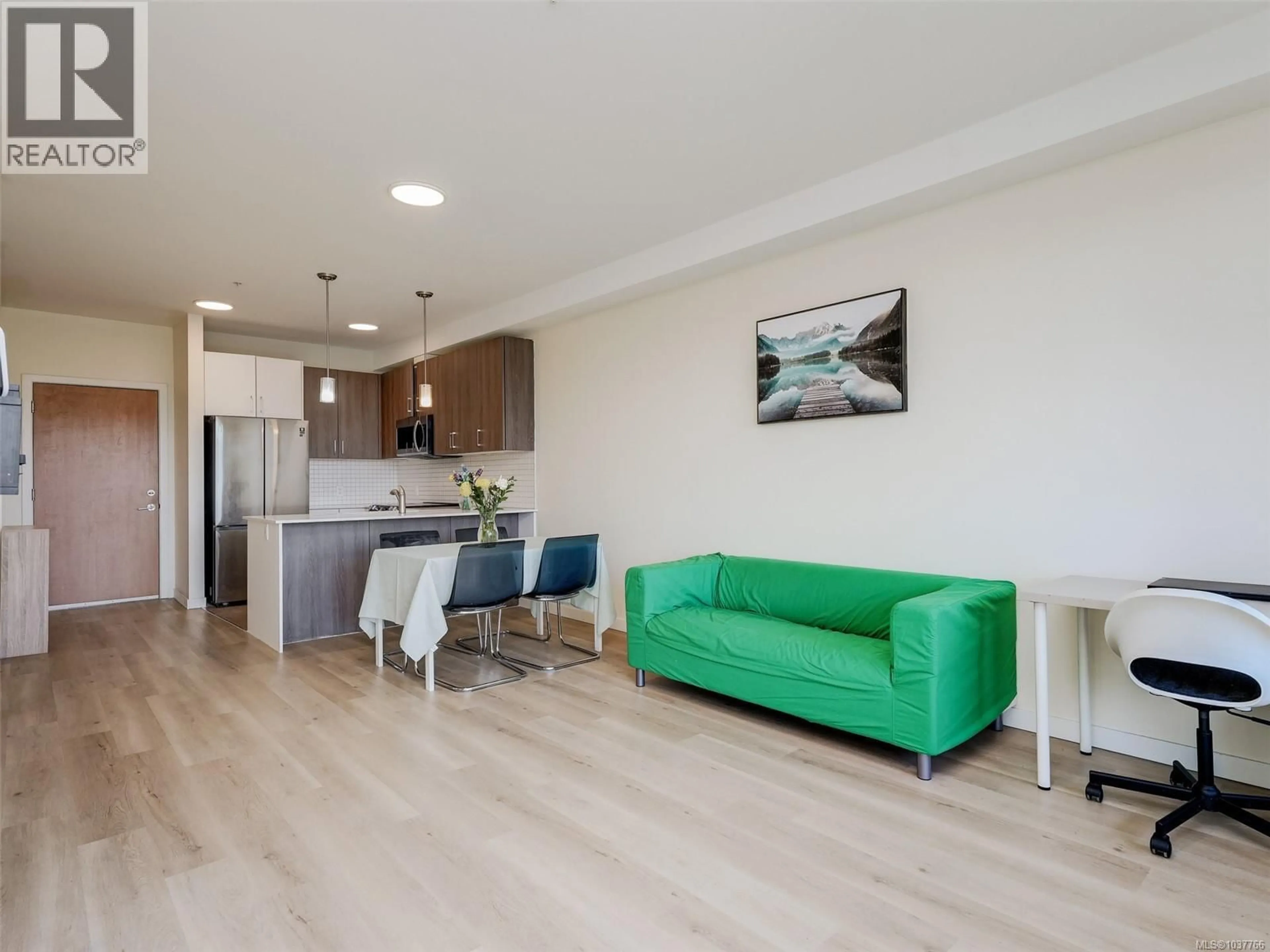 Living room with furniture, wood/laminate floor for 504 - 815 ORONO AVENUE, Langford British Columbia V9B2T9