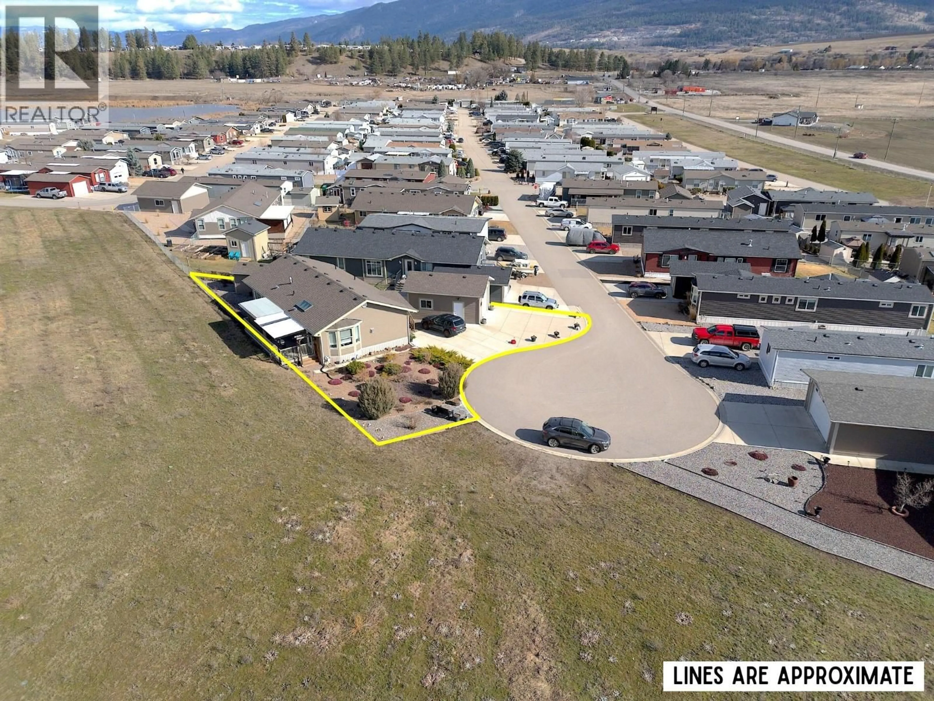 A pic from outside/outdoor area/front of a property/back of a property/a pic from drone, street for 89 - 12560 WESTSIDE ROAD, Vernon British Columbia V1H1S9