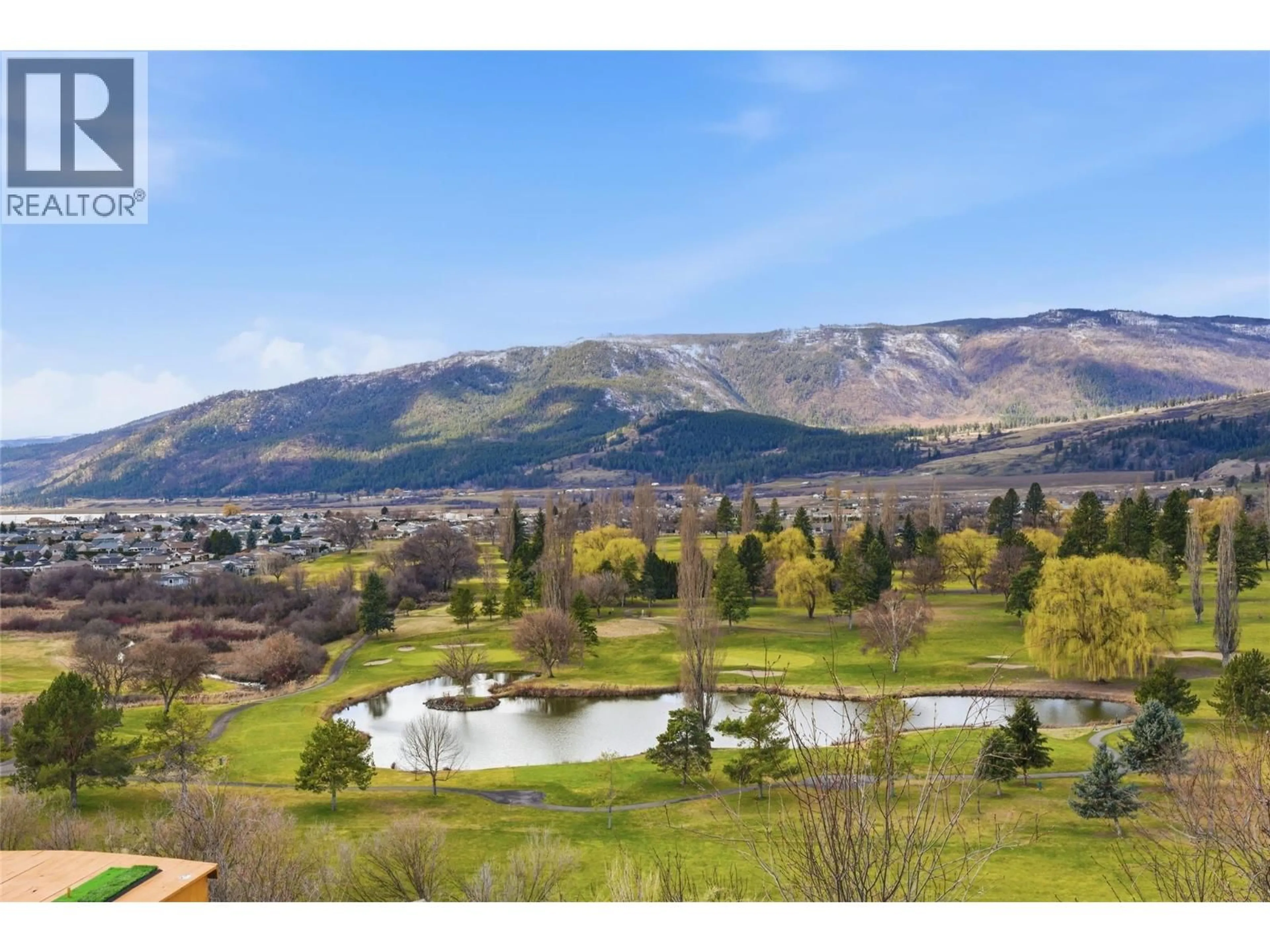 A pic from outside/outdoor area/front of a property/back of a property/a pic from drone, mountain view for 463 GOLFVIEW PLACE, Spallumcheen British Columbia V1H2J9