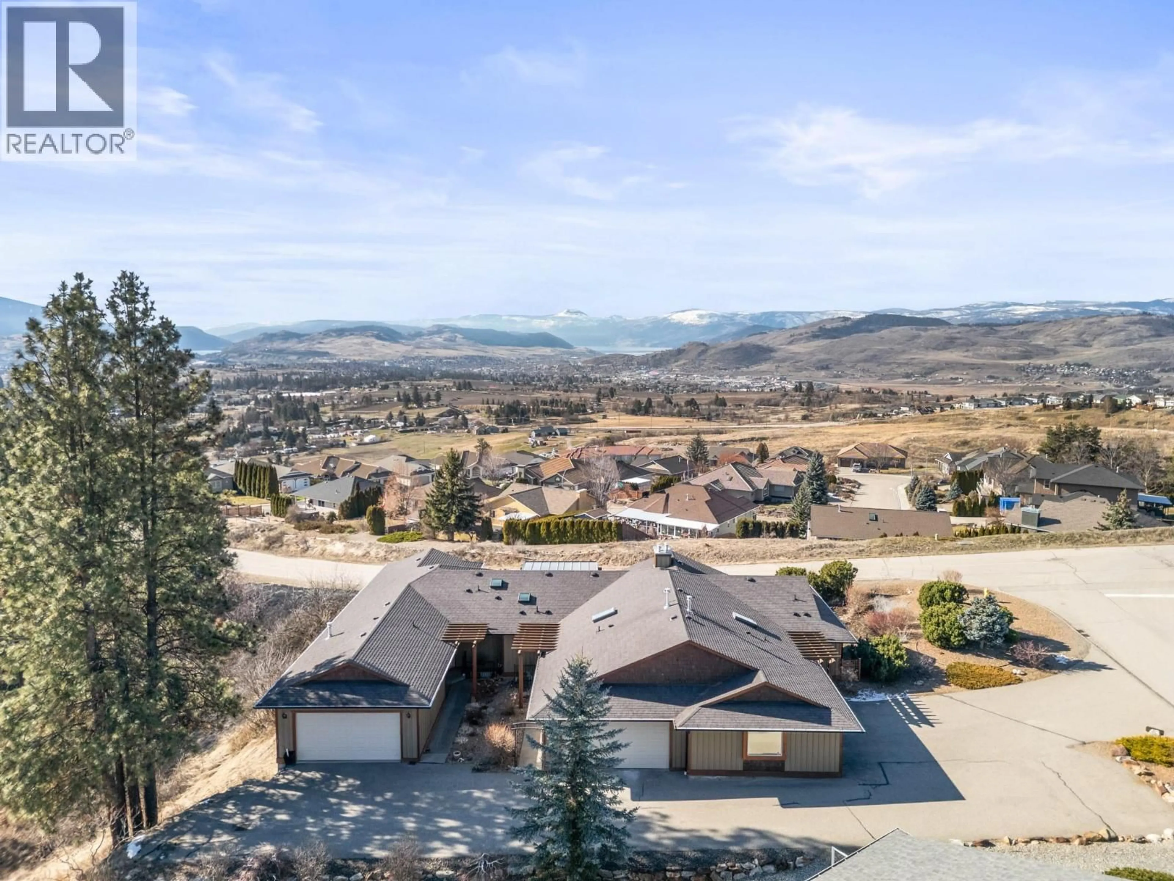 A pic from outside/outdoor area/front of a property/back of a property/a pic from drone, mountain view for 3 - 6900 MANNING PLACE, Vernon British Columbia V1B2Y5