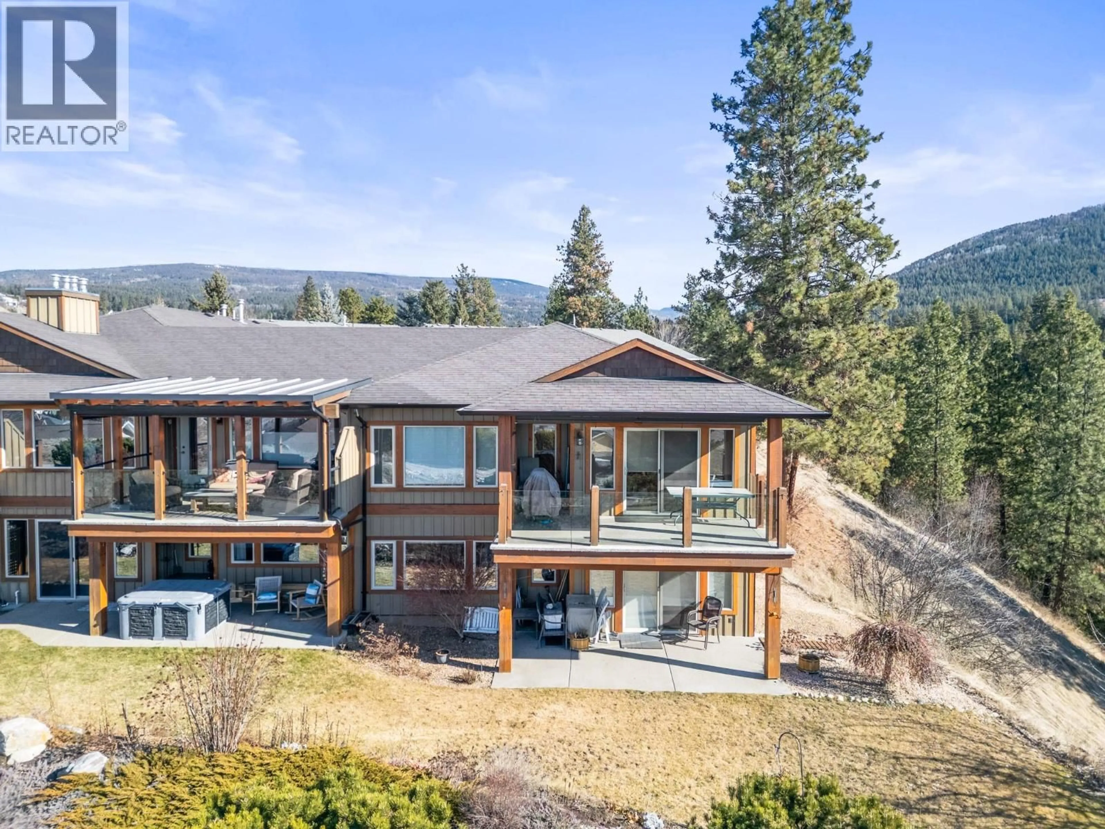 A pic from outside/outdoor area/front of a property/back of a property/a pic from drone, mountain view for 3 - 6900 MANNING PLACE, Vernon British Columbia V1B2Y5