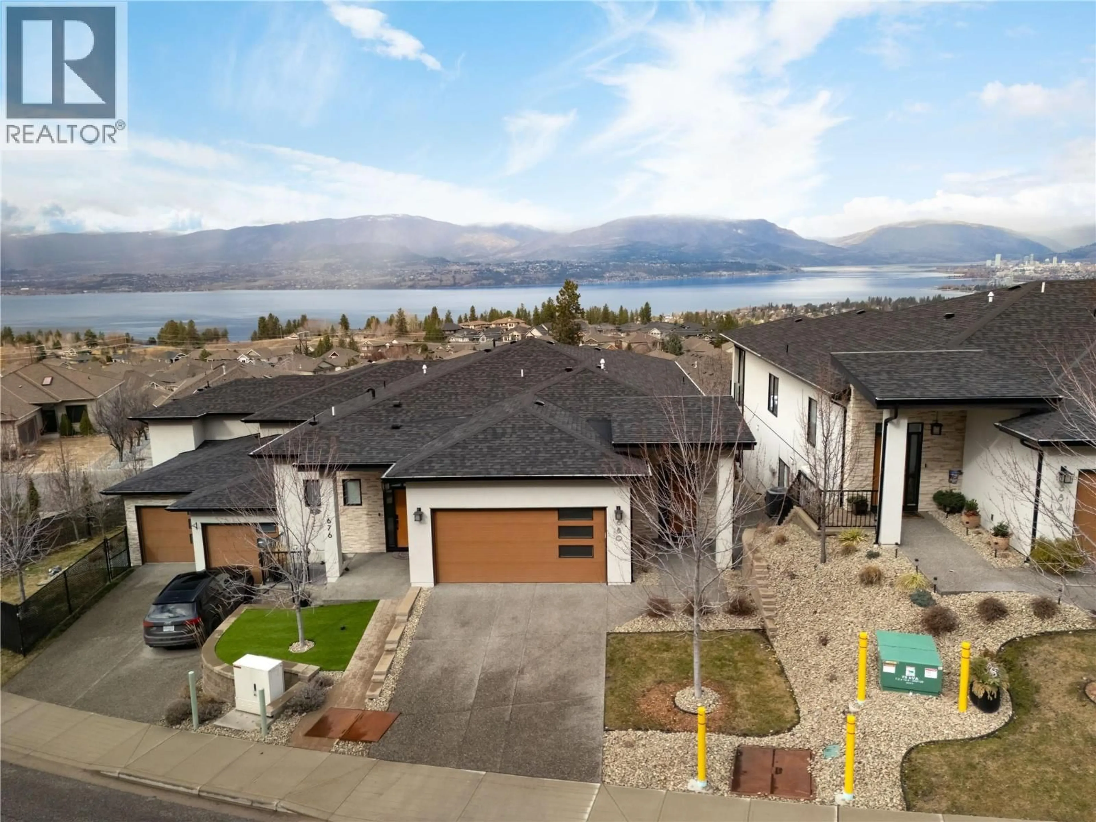 A pic from outside/outdoor area/front of a property/back of a property/a pic from drone, water/lake/river/ocean view for 680 CANTINA COURT, Kelowna British Columbia V1W4X6