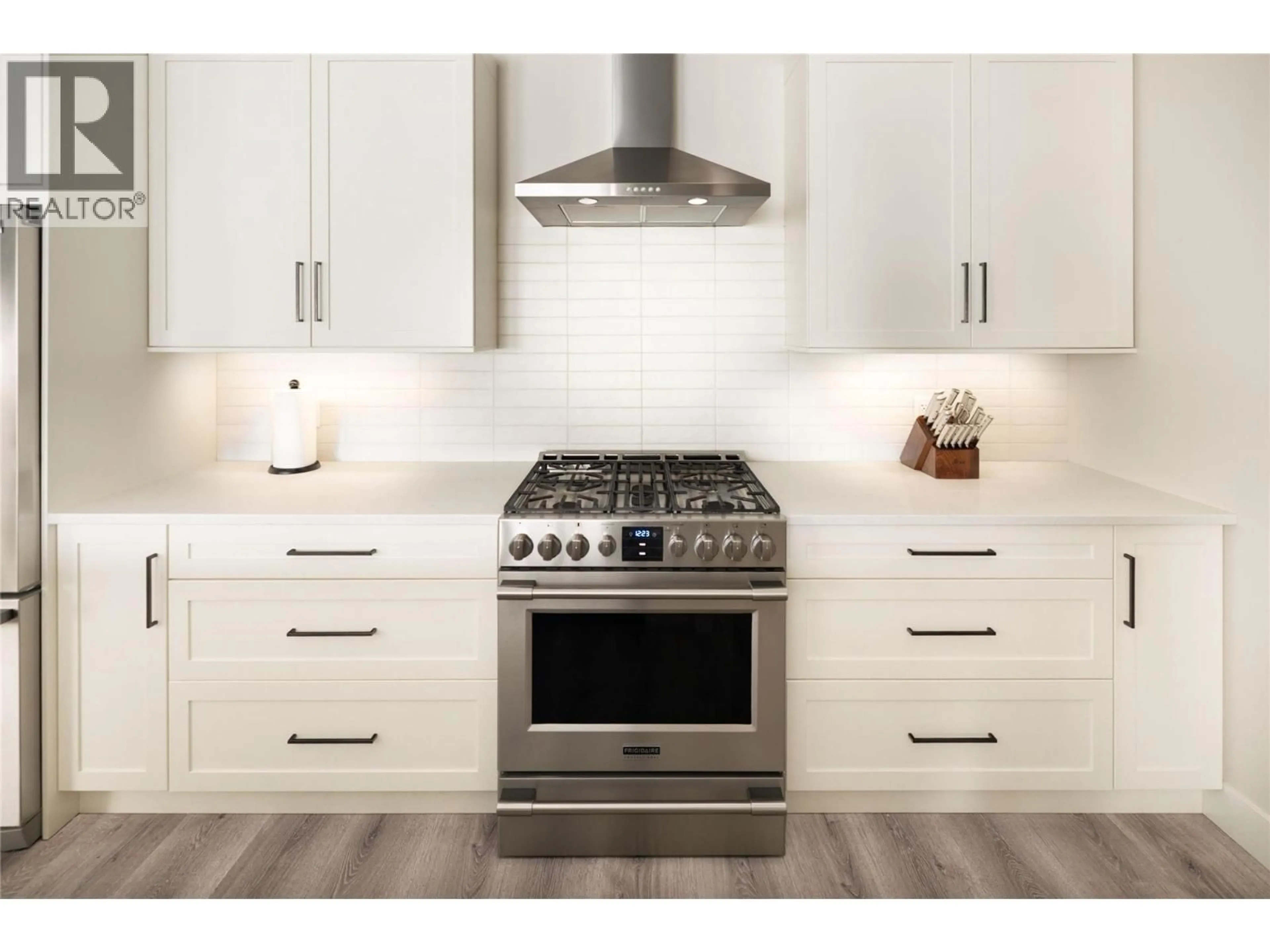 Contemporary kitchen, ceramic/tile floor for 680 CANTINA COURT, Kelowna British Columbia V1W4X6