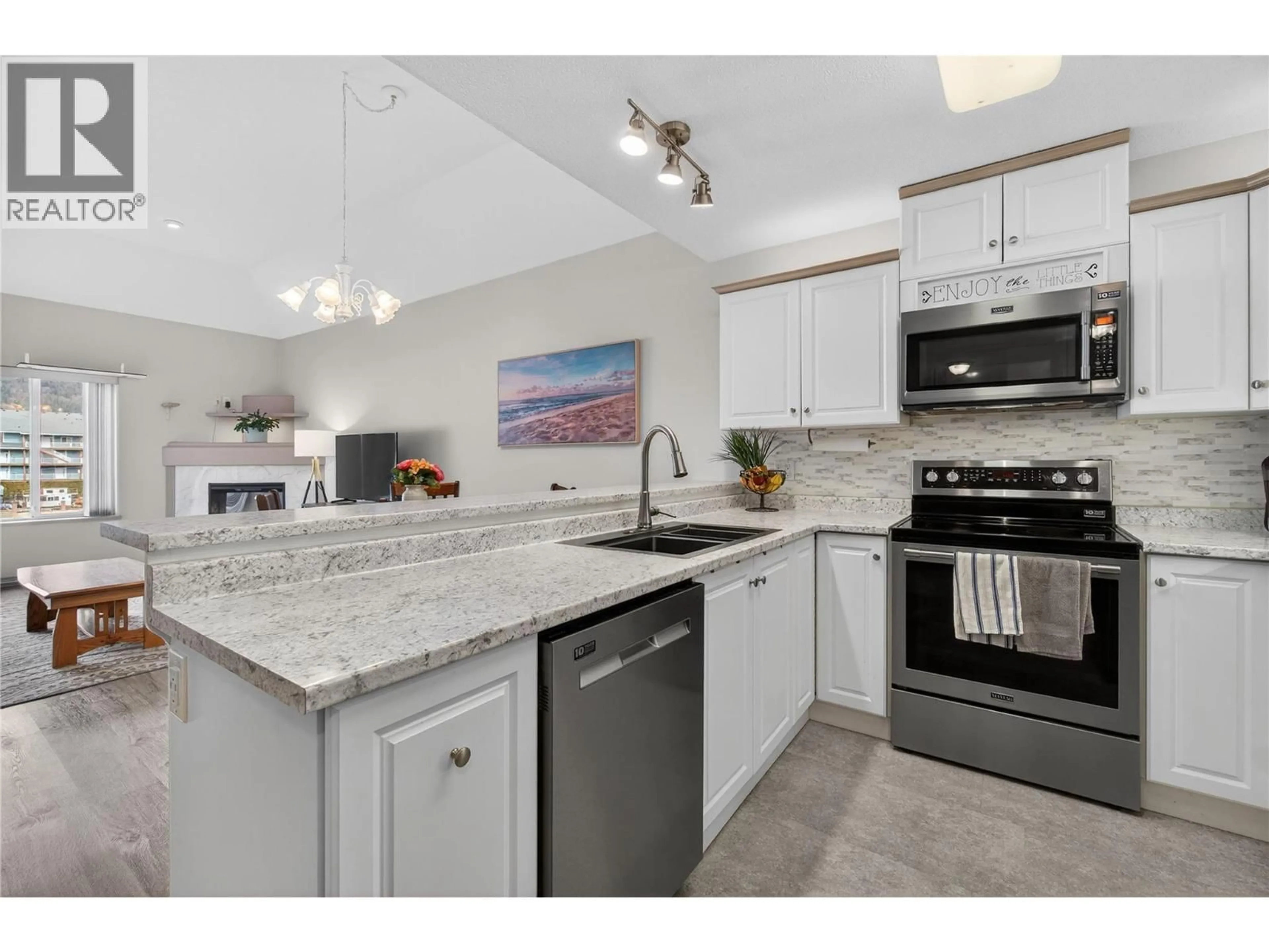 Open concept kitchen, ceramic/tile floor for 314 - 1002 RIVERSIDE AVENUE, Sicamous British Columbia V0E2V1