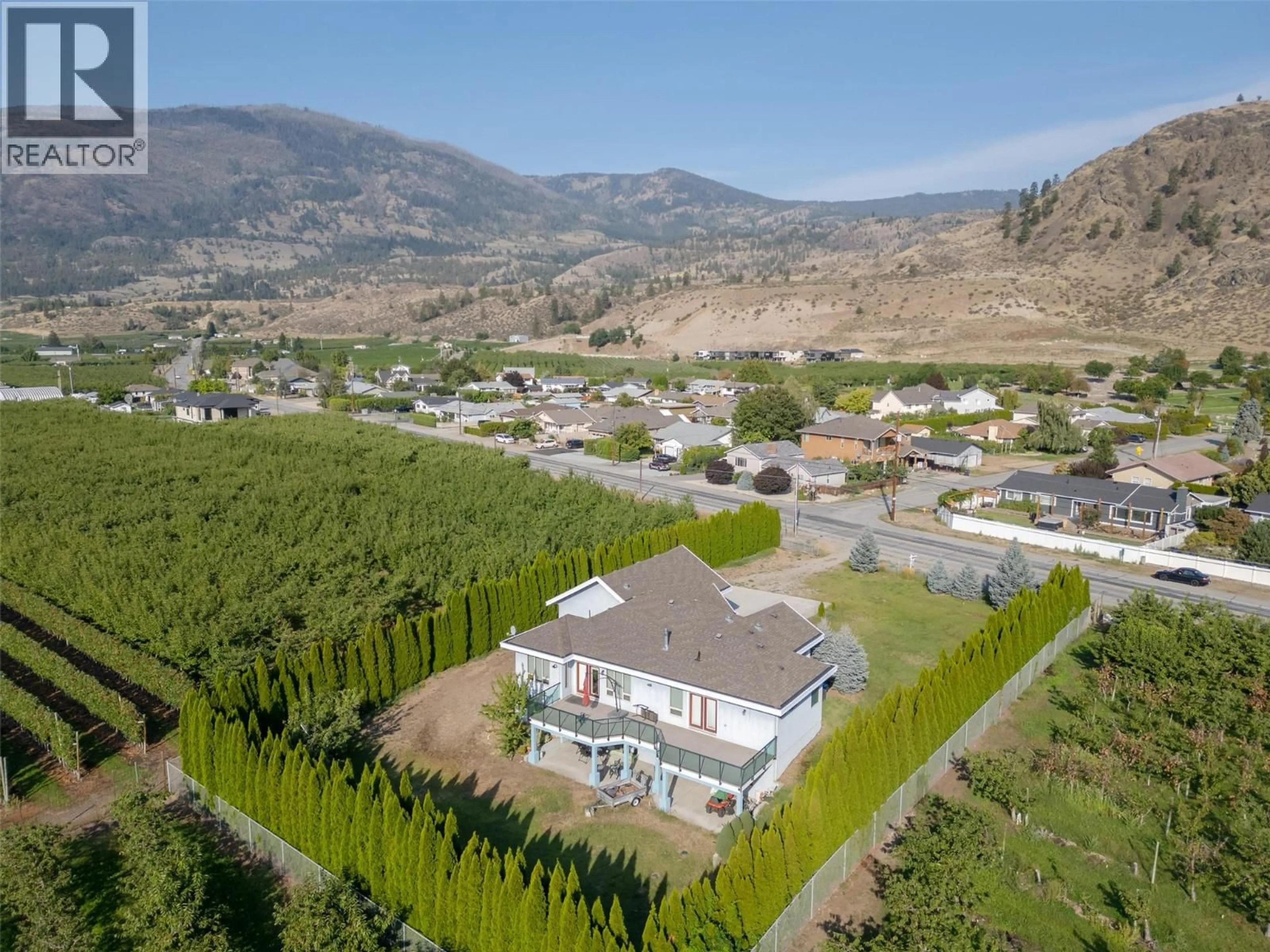 A pic from outside/outdoor area/front of a property/back of a property/a pic from drone, mountain view for 1095 FAIRVIEW ROAD, Oliver British Columbia V0H1T1