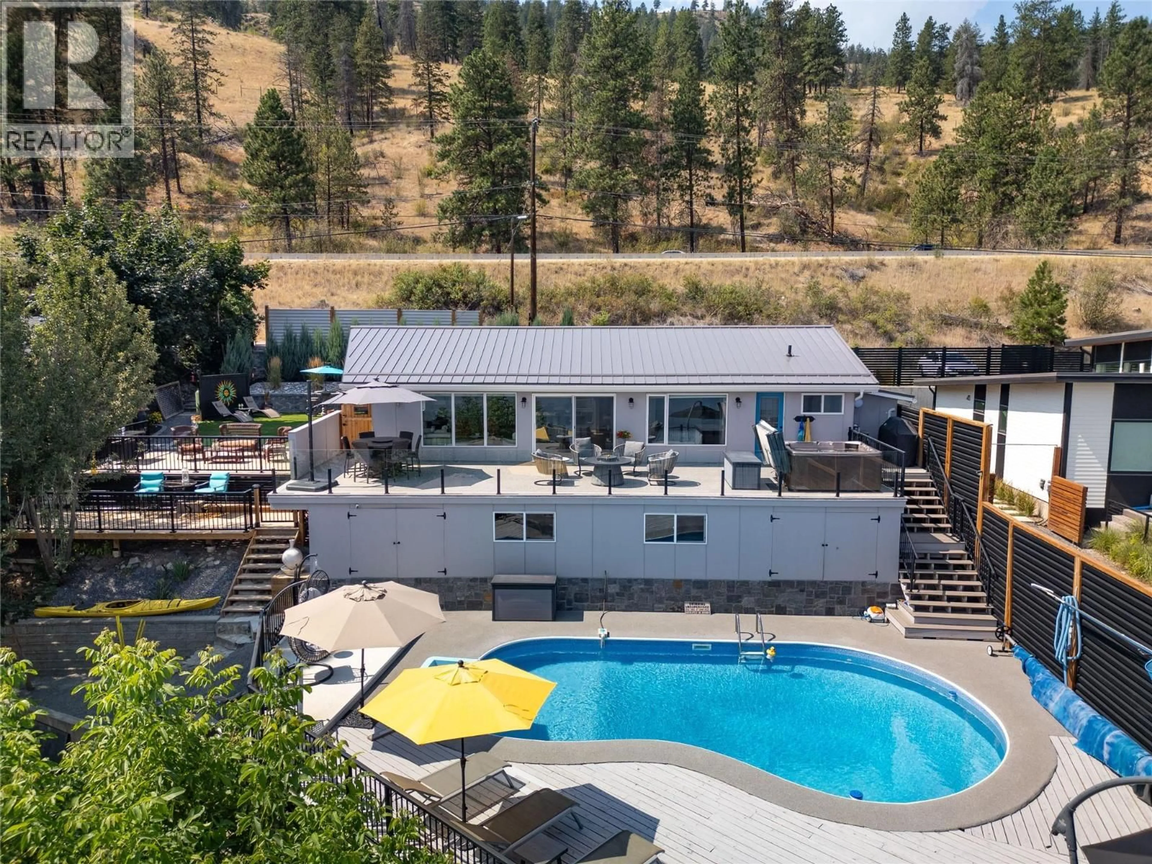A pic from outside/outdoor area/front of a property/back of a property/a pic from drone, water/lake/river/ocean view for 7192 BRENT ROAD, Peachland British Columbia V0H1X7