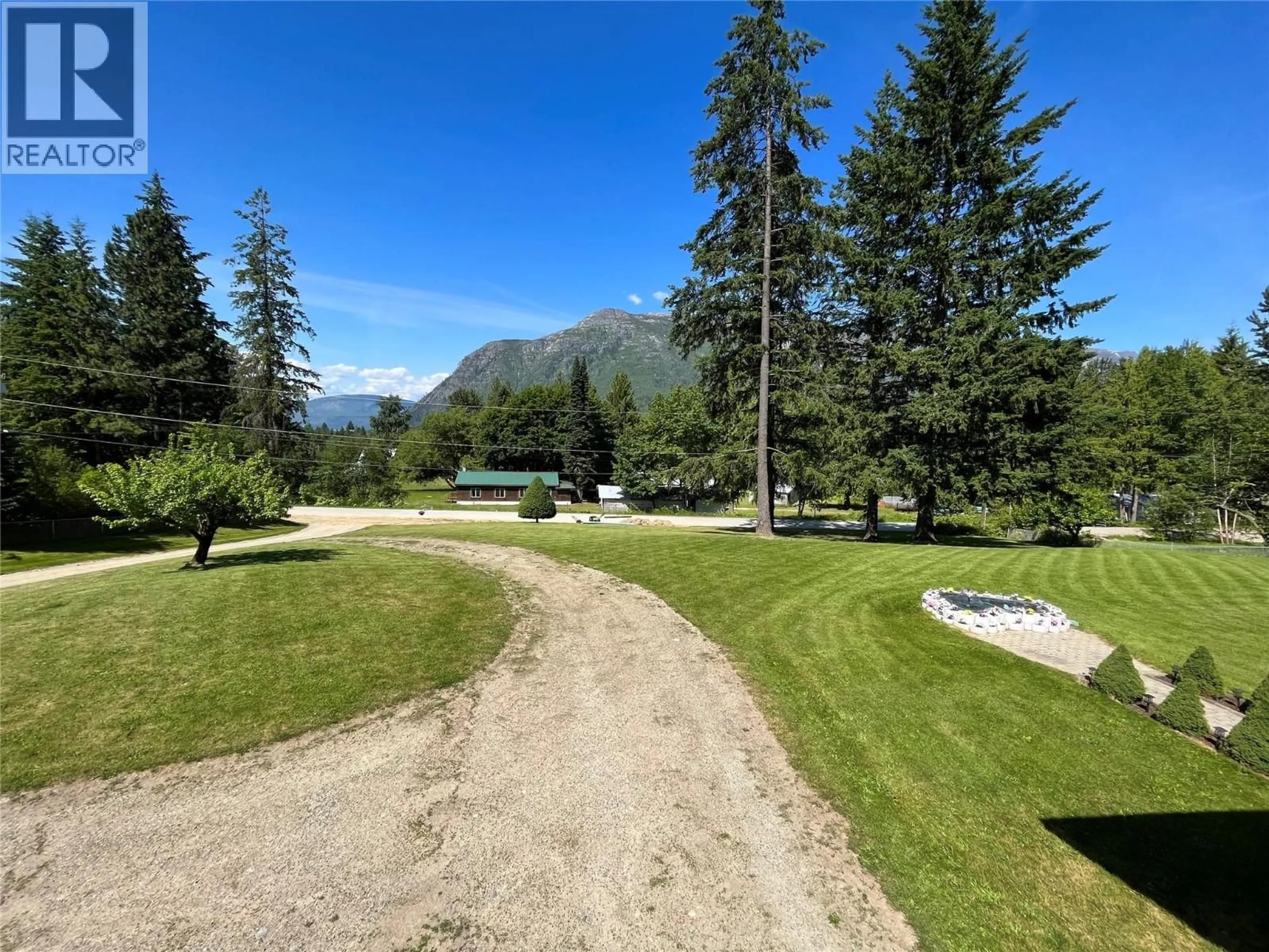 A pic from outside/outdoor area/front of a property/back of a property/a pic from drone, mountain view for 213 BURTON SCHOOL ROAD, Burton British Columbia V0G1R0
