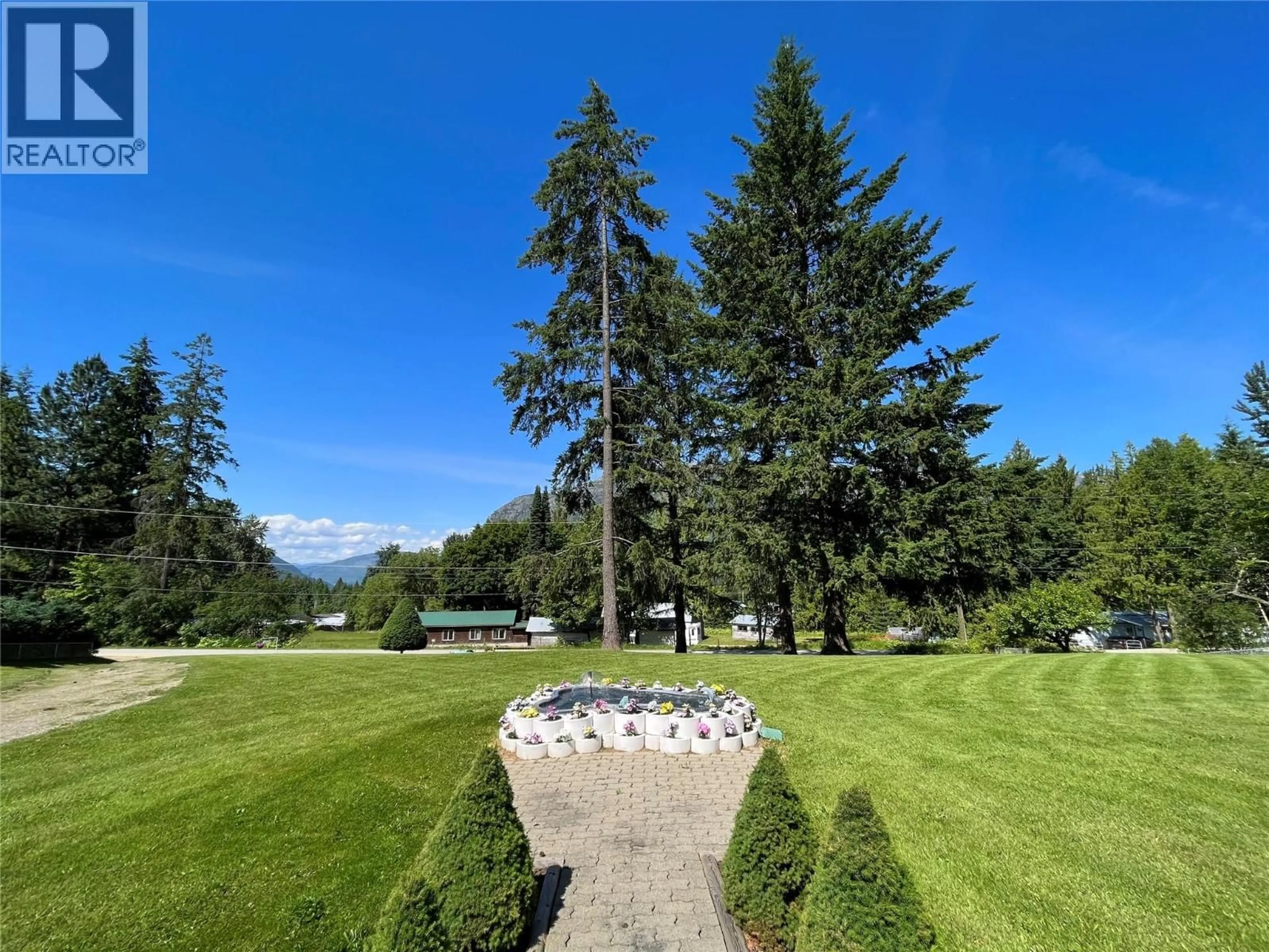 A pic from outside/outdoor area/front of a property/back of a property/a pic from drone, mountain view for 213 BURTON SCHOOL ROAD, Burton British Columbia V0G1R0
