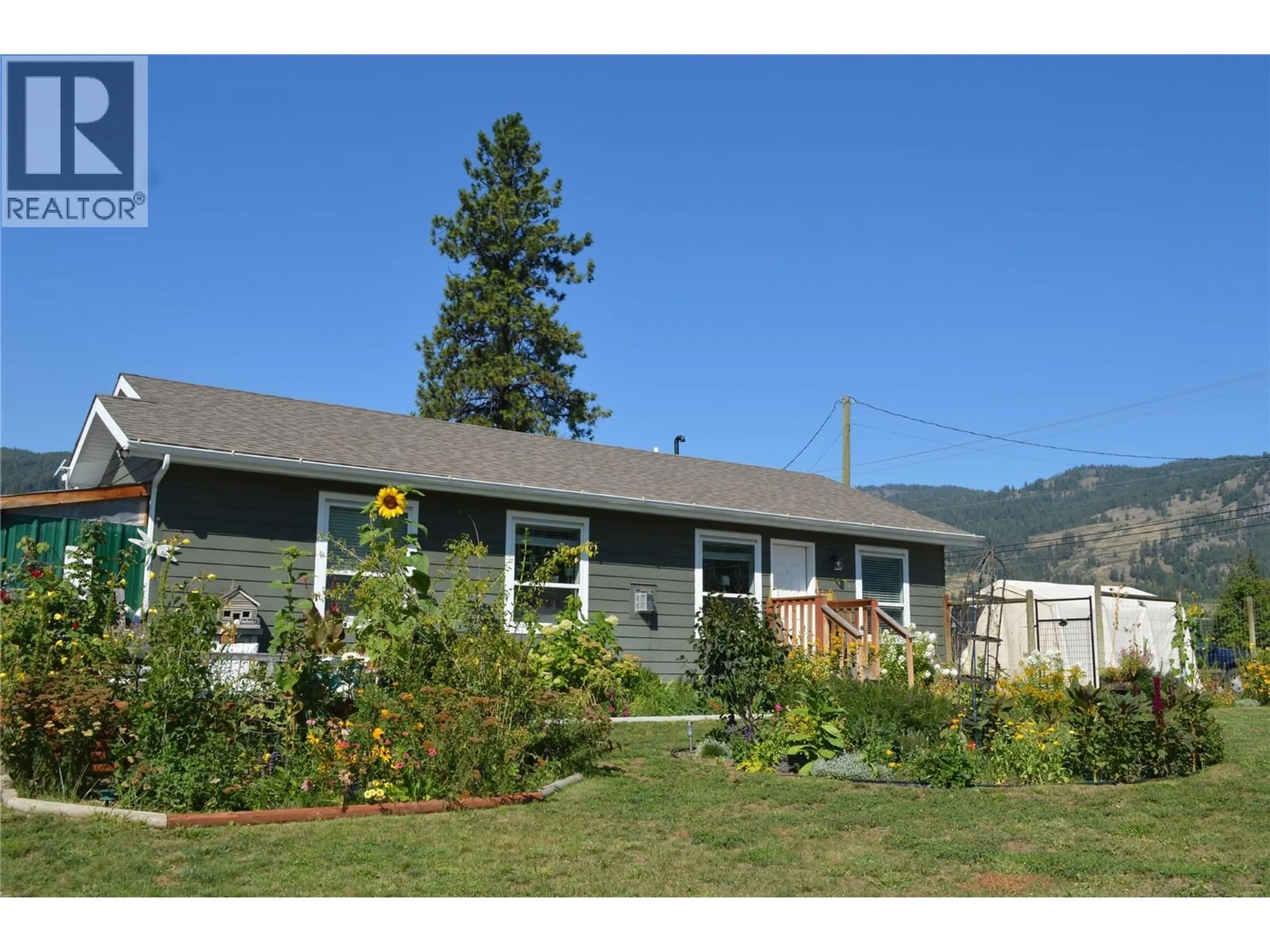 Home with vinyl exterior material, mountain view for 8187 DONALDSON DRIVE, Grand Forks British Columbia V0H1H2