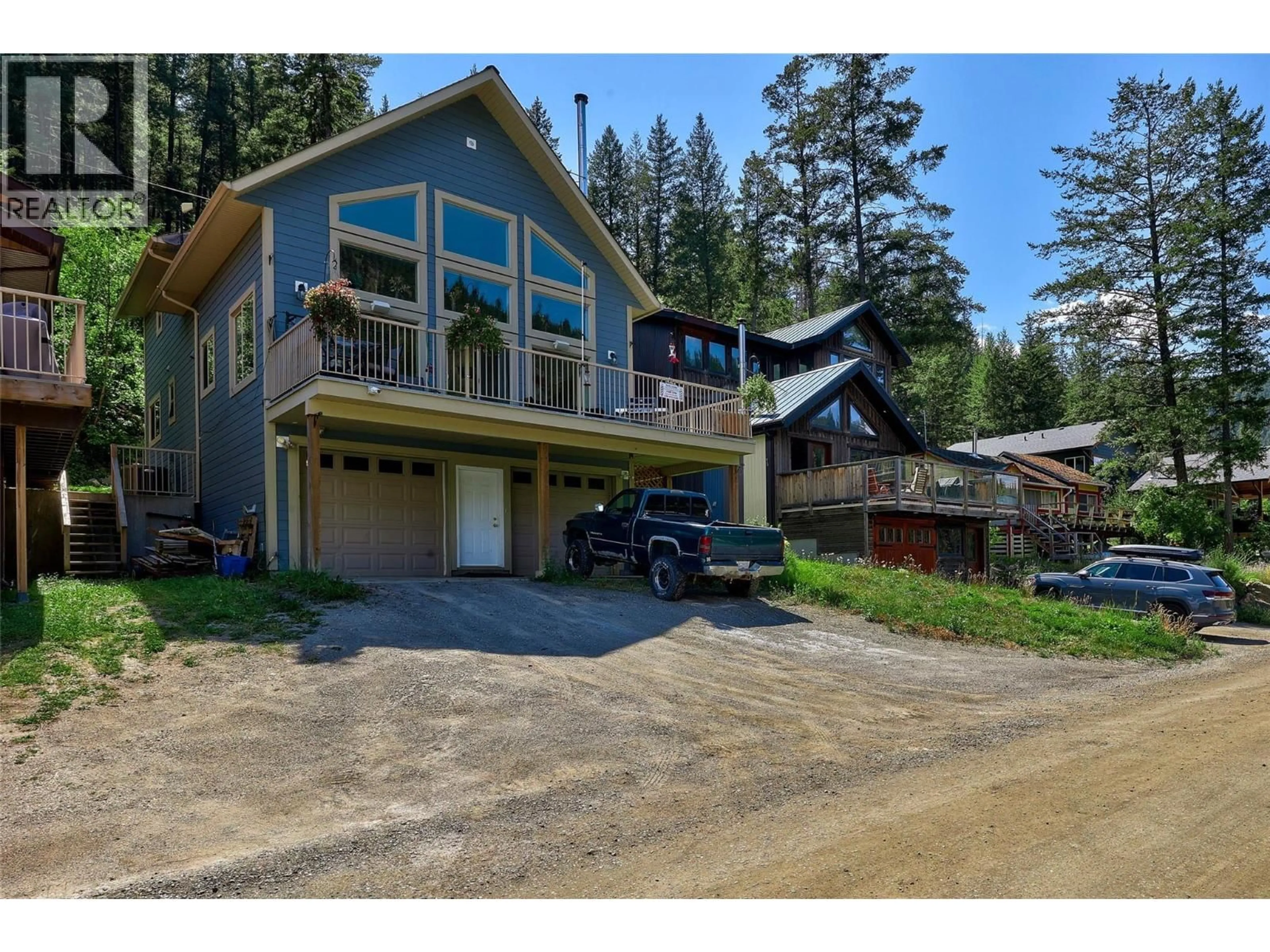 A pic from outside/outdoor area/front of a property/back of a property/a pic from drone, street for 1848 PAUL LAKE ROAD, Kamloops British Columbia V2H1N8