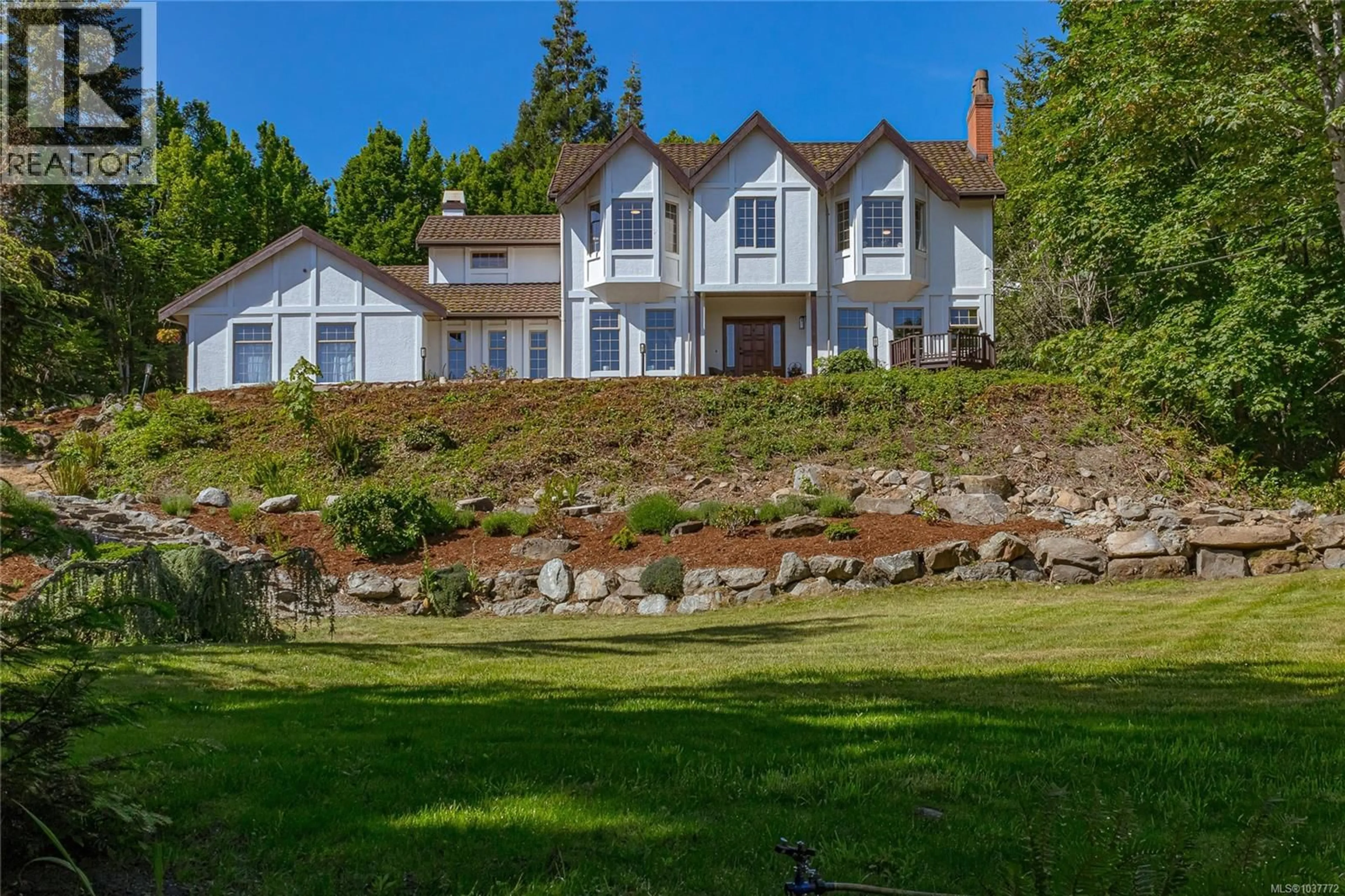 A pic from outside/outdoor area/front of a property/back of a property/a pic from drone, water/lake/river/ocean view for 1855 CAMAS DRIVE, North Saanich British Columbia V8L5N6