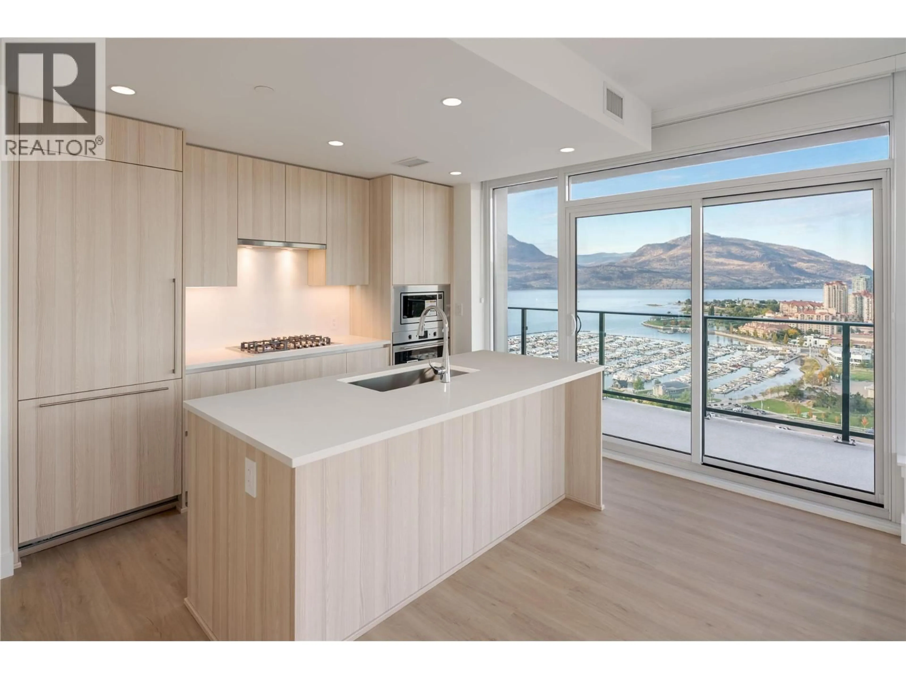 Open concept kitchen, wood/laminate floor for 2202 - 1626 WATER STREET, Kelowna British Columbia V1Y0N7