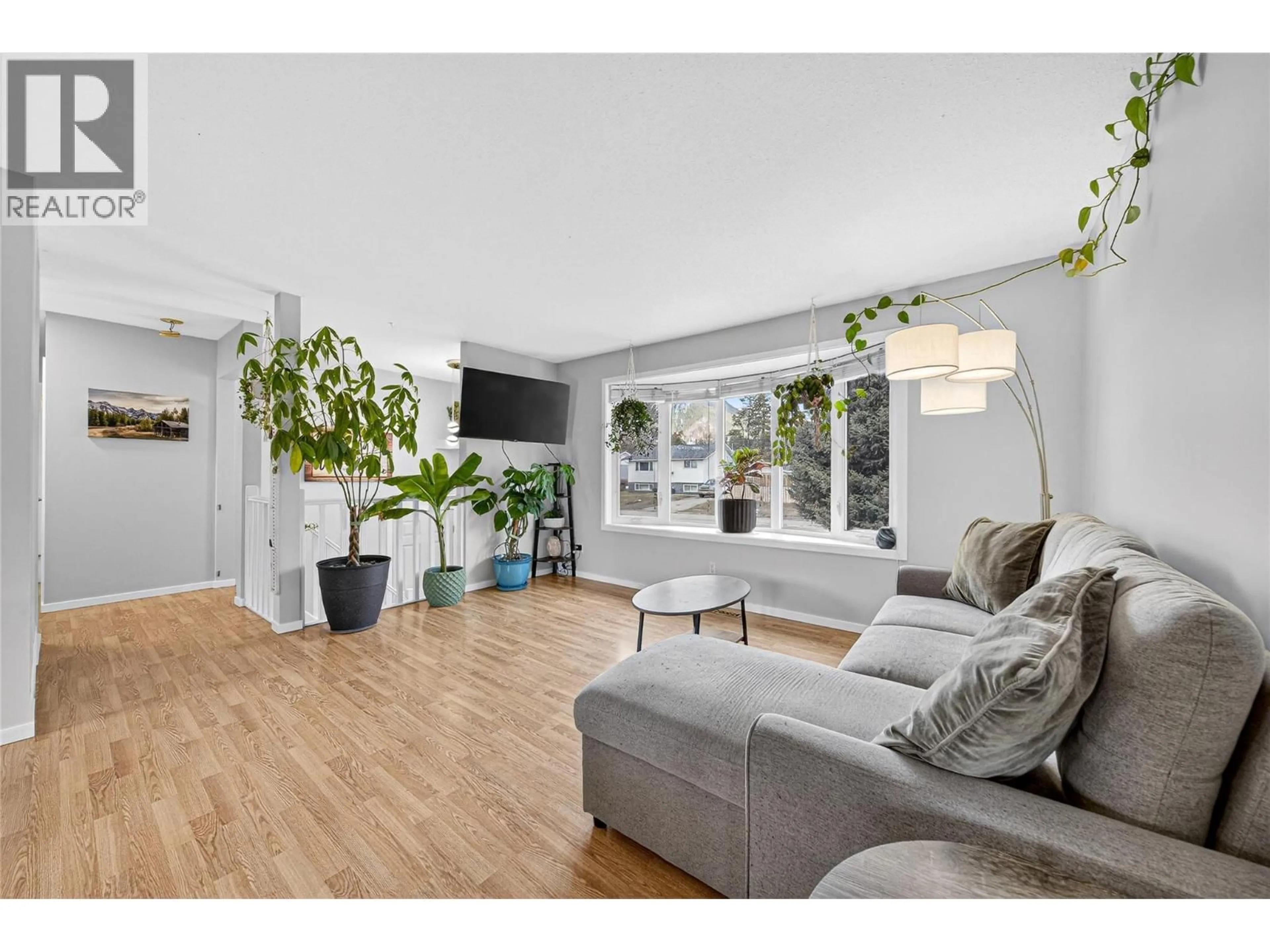 Living room with furniture, wood/laminate floor for 345 PACIFIC YEW CRESCENT, Sparwood British Columbia V0B2G0