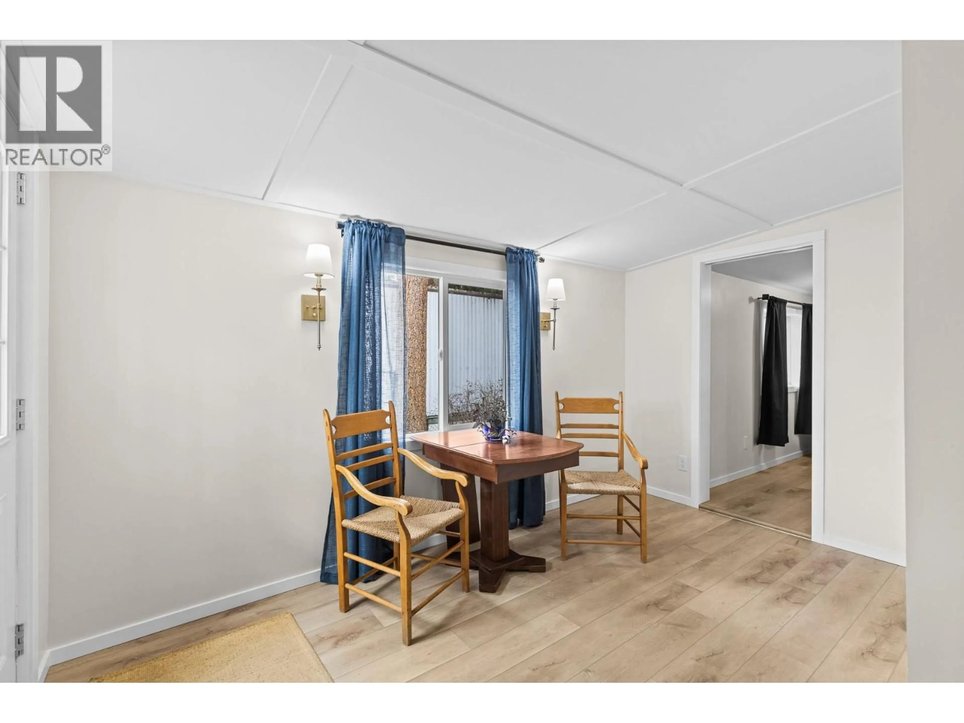 Dining room, wood/laminate floor for 9 - 5432 CHIDLEY ROAD, Peachland British Columbia V0H1X5