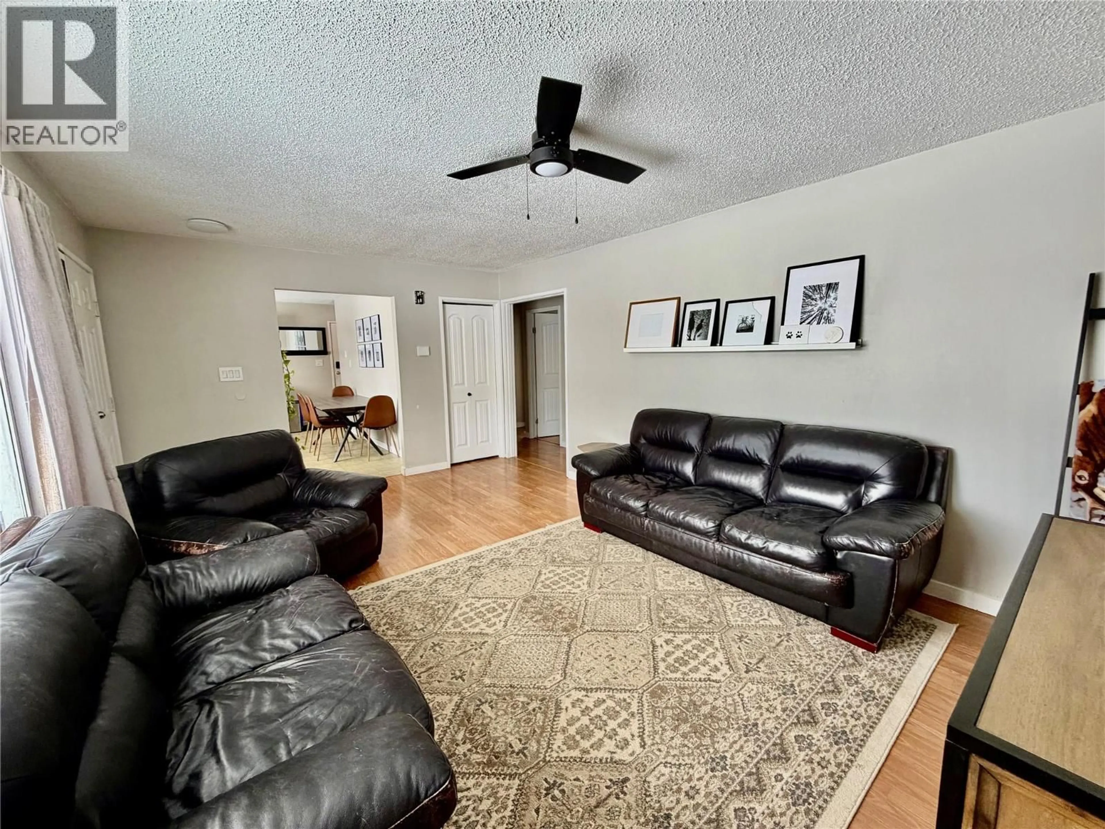 Living room with furniture, unknown for 313 98 AVENUE, Dawson Creek British Columbia V1G1R8
