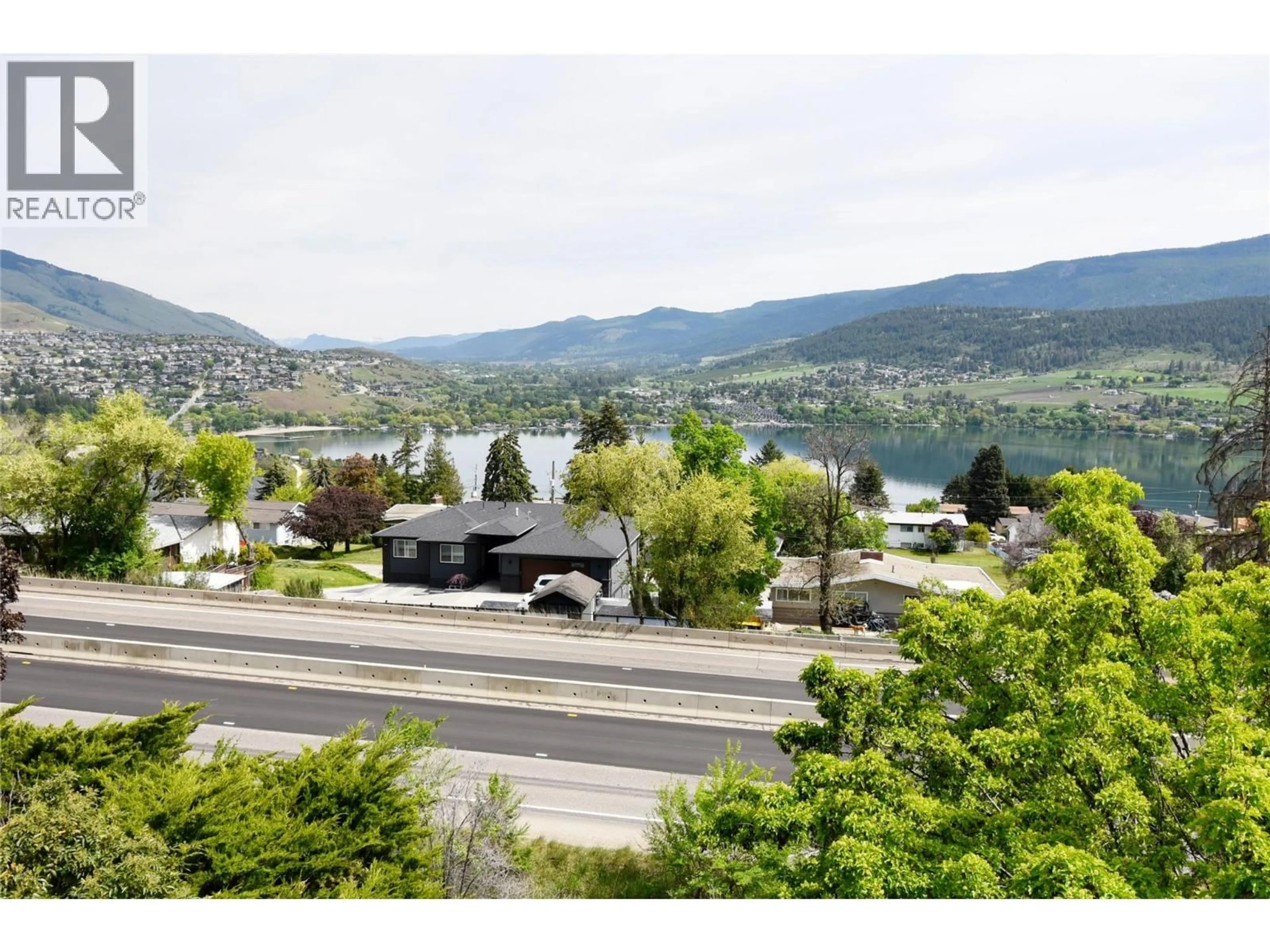 A pic from outside/outdoor area/front of a property/back of a property/a pic from drone, mountain view for 3 - 8700 CLERKE ROAD, Coldstream British Columbia V0E1W2