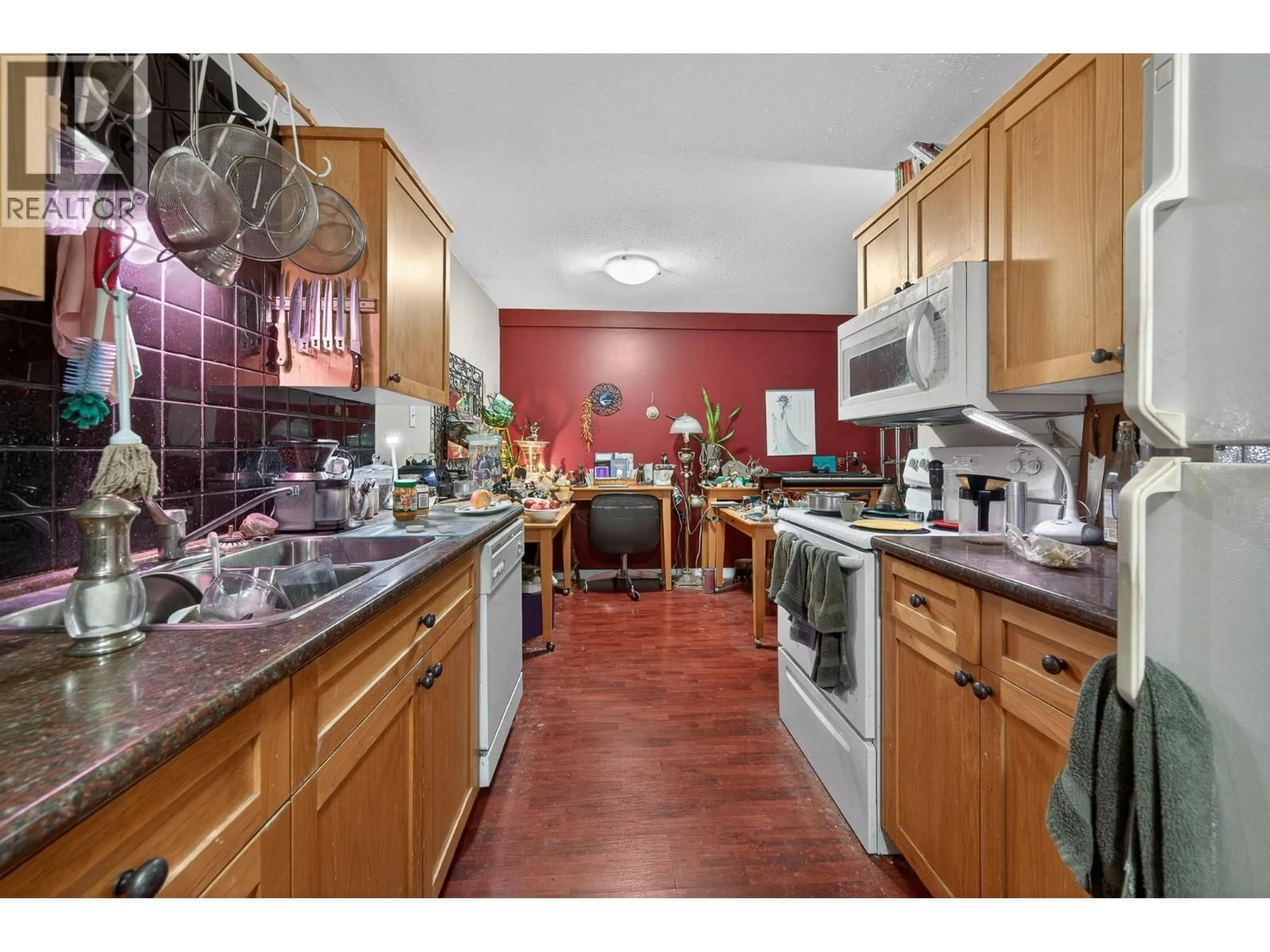 Standard kitchen, ceramic/tile floor for 106 - 1560 SUMMIT DRIVE, Kamloops British Columbia V2E1R5