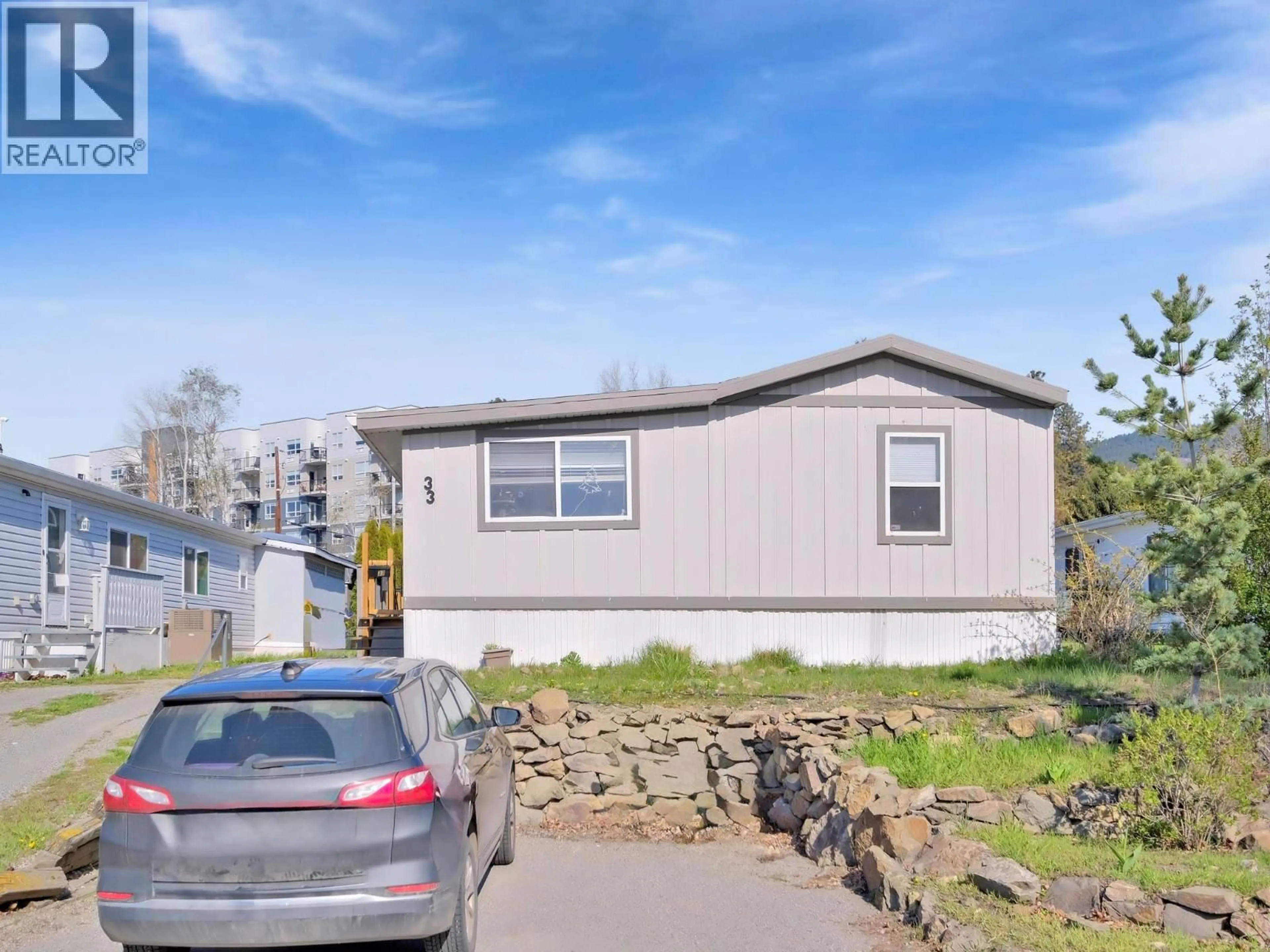 Home with vinyl exterior material, street for 33 - 3381 VILLAGE GREEN WAY, Westbank British Columbia V4T1L2