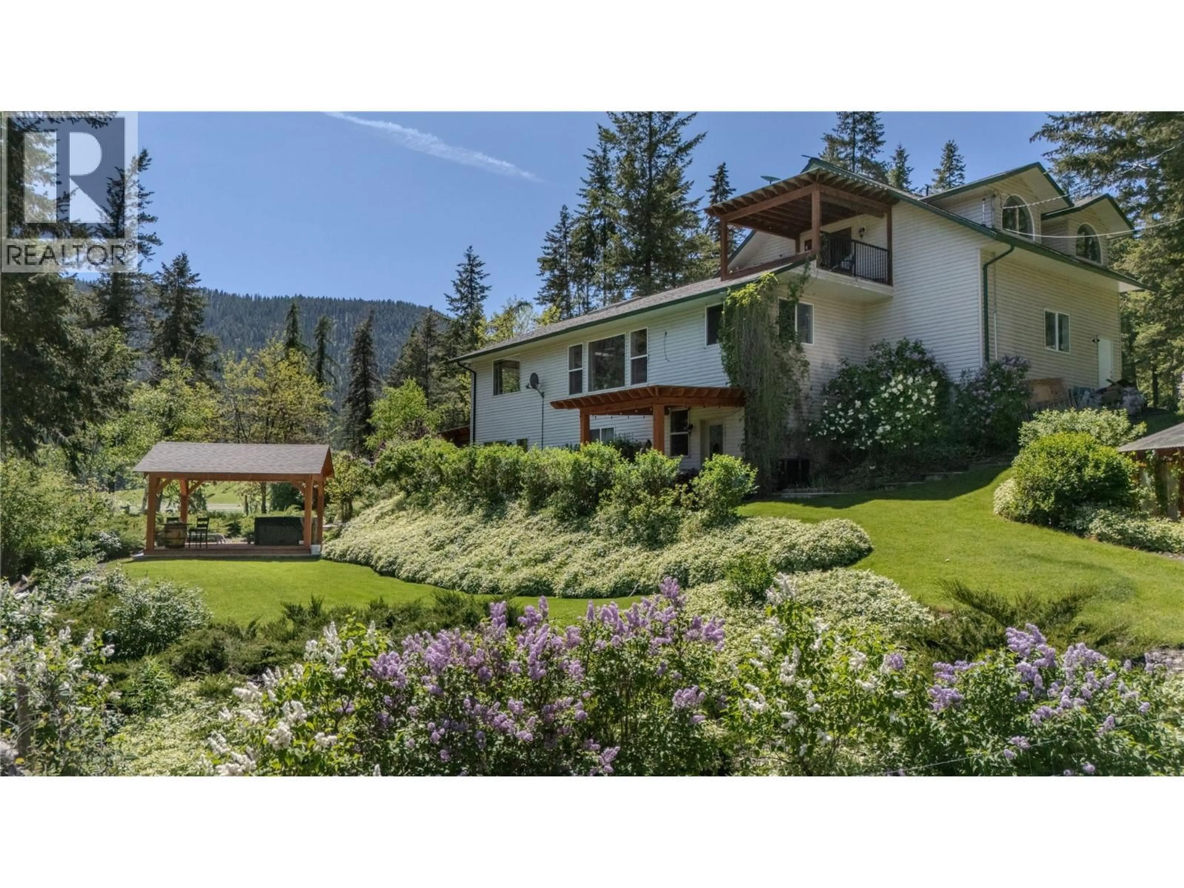 A pic from outside/outdoor area/front of a property/back of a property/a pic from drone, mountain view for 157 HARRIS CREEK ROAD, Lumby British Columbia V0E2G1