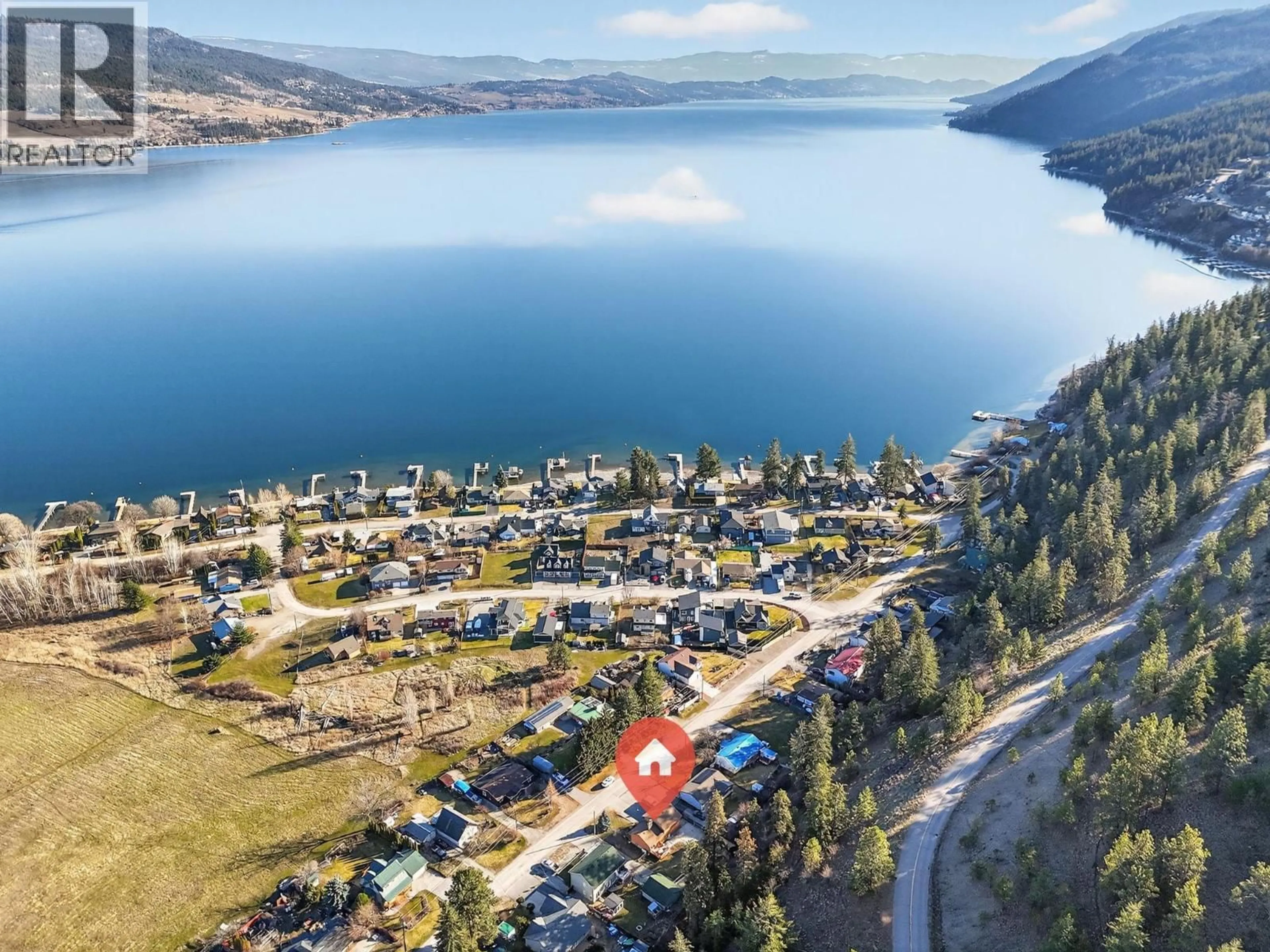 A pic from outside/outdoor area/front of a property/back of a property/a pic from drone, water/lake/river/ocean view for 7312 FINTRY DELTA ROAD, Kelowna British Columbia V1Z3V2