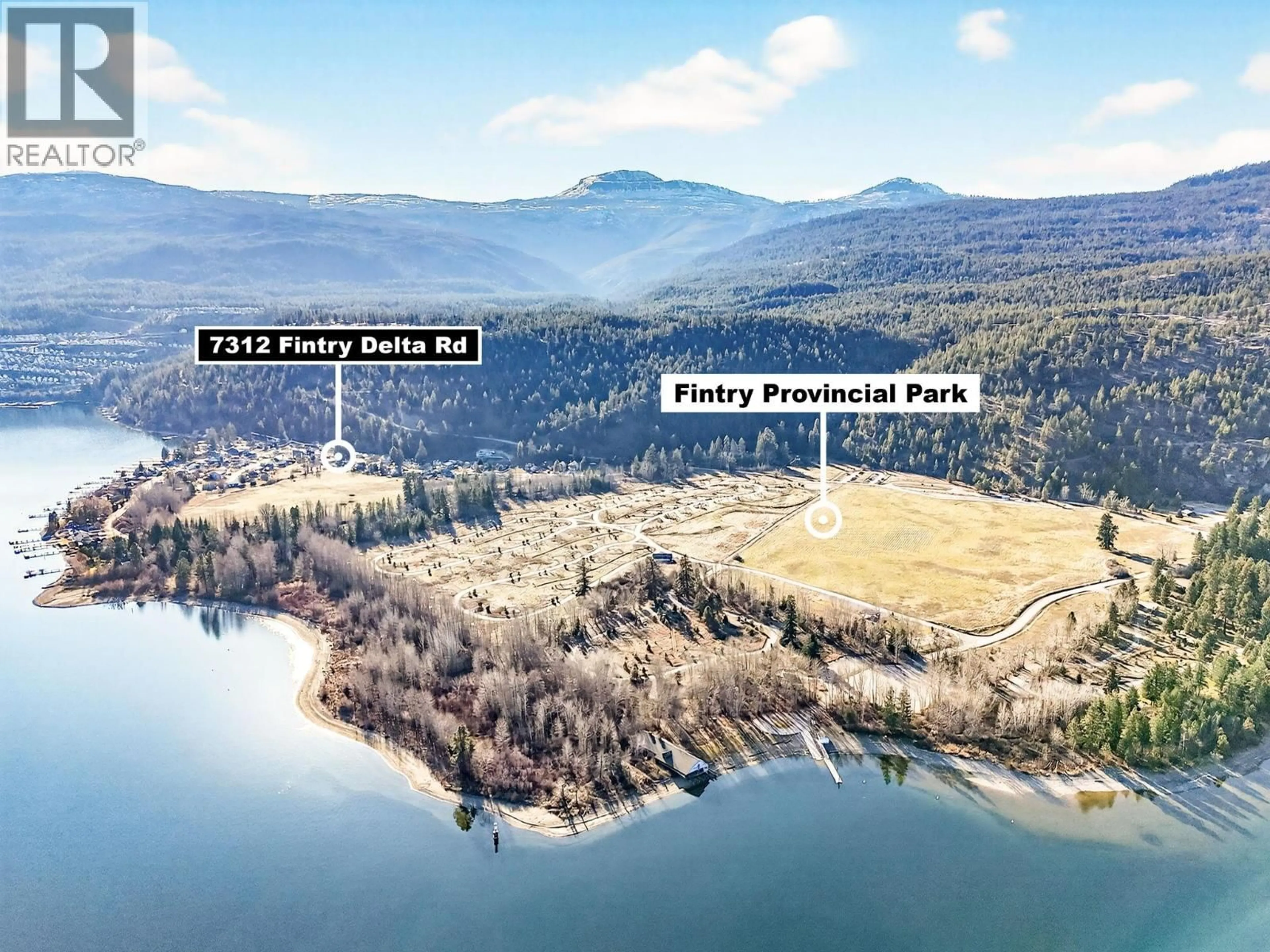 A pic from outside/outdoor area/front of a property/back of a property/a pic from drone, water/lake/river/ocean view for 7312 FINTRY DELTA ROAD, Kelowna British Columbia V1Z3V2