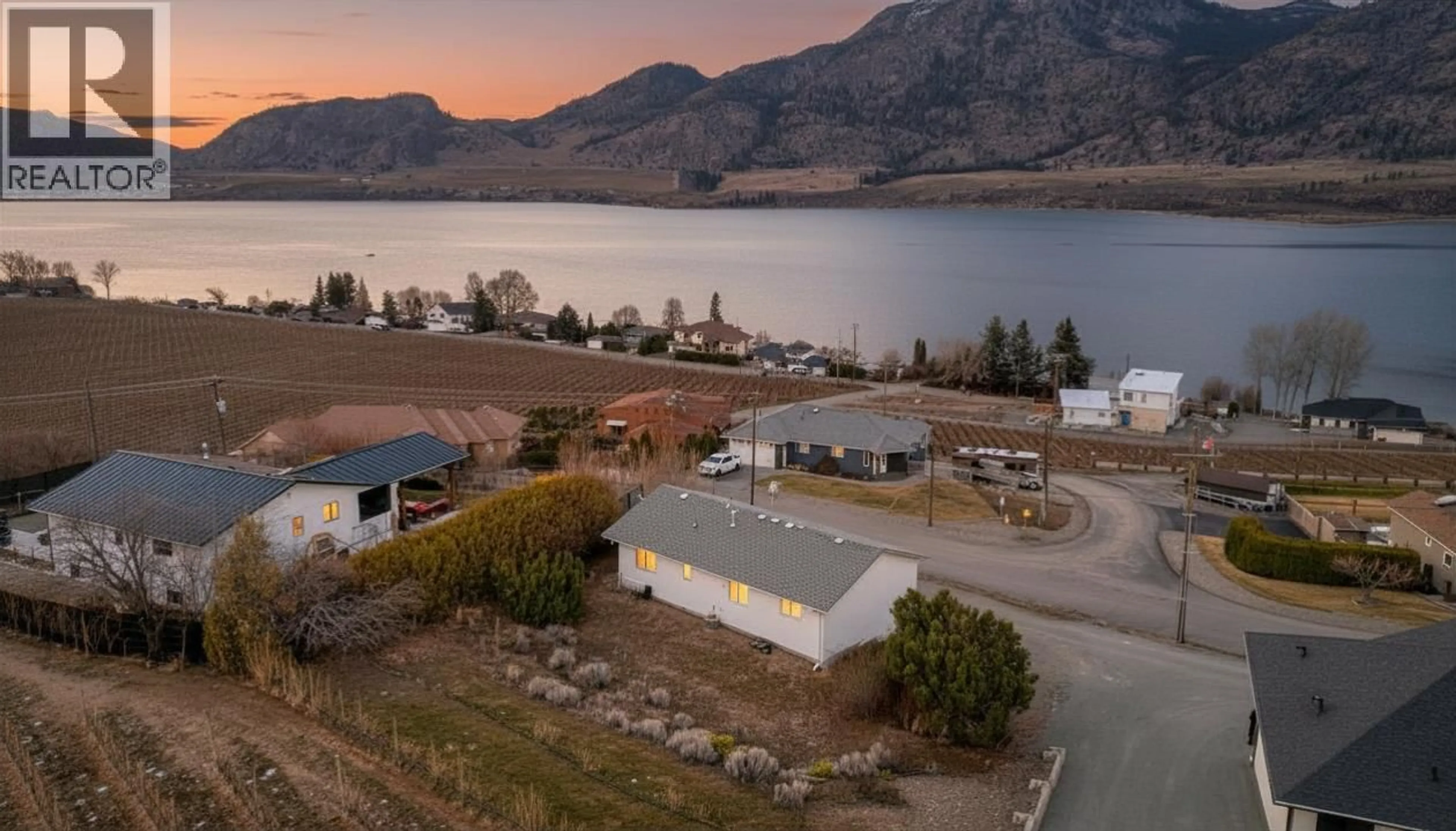 A pic from outside/outdoor area/front of a property/back of a property/a pic from drone, water/lake/river/ocean view for 10408 87TH STREET, Osoyoos British Columbia V0H1V2