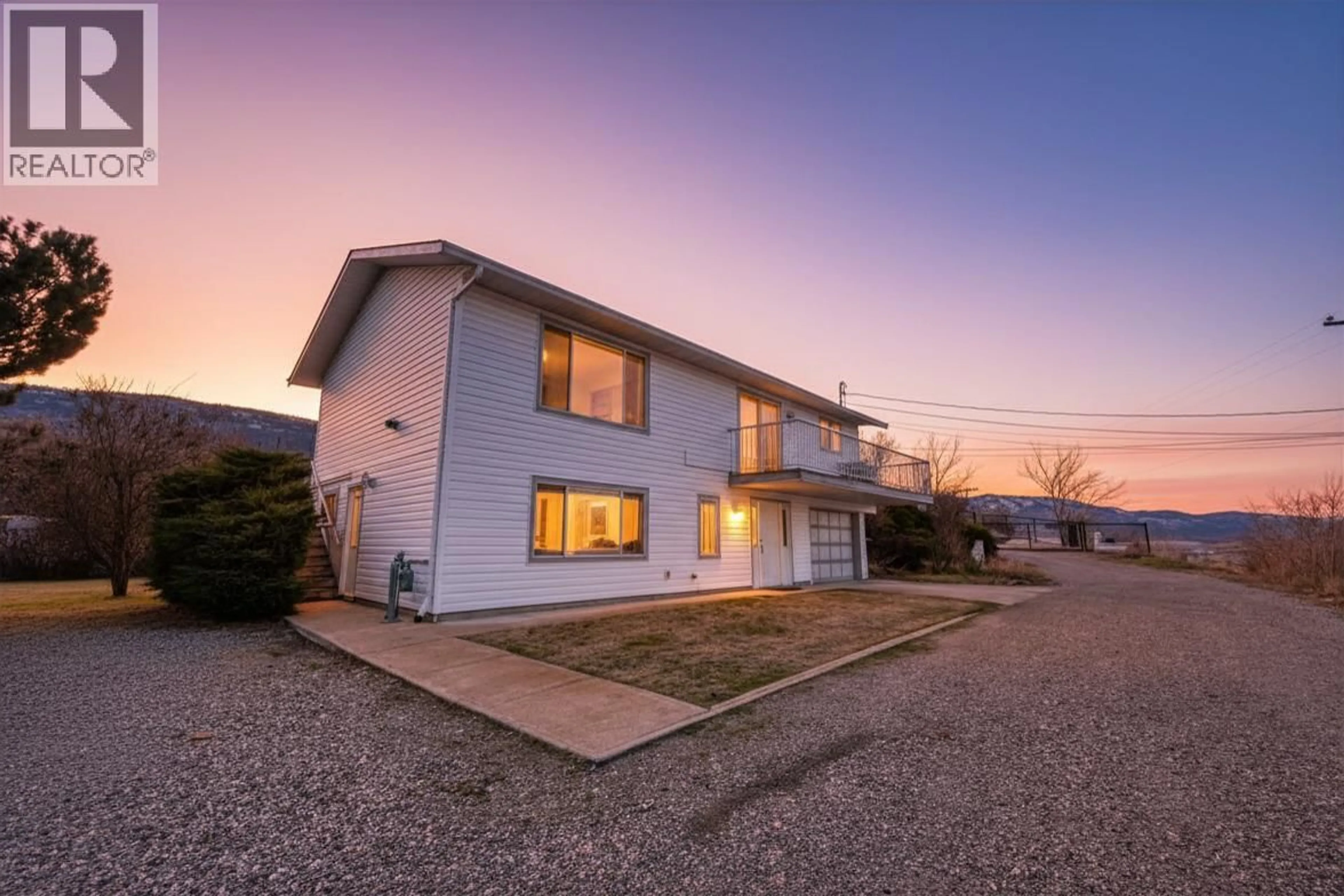 A pic from outside/outdoor area/front of a property/back of a property/a pic from drone, street for 10408 87TH STREET, Osoyoos British Columbia V0H1V2