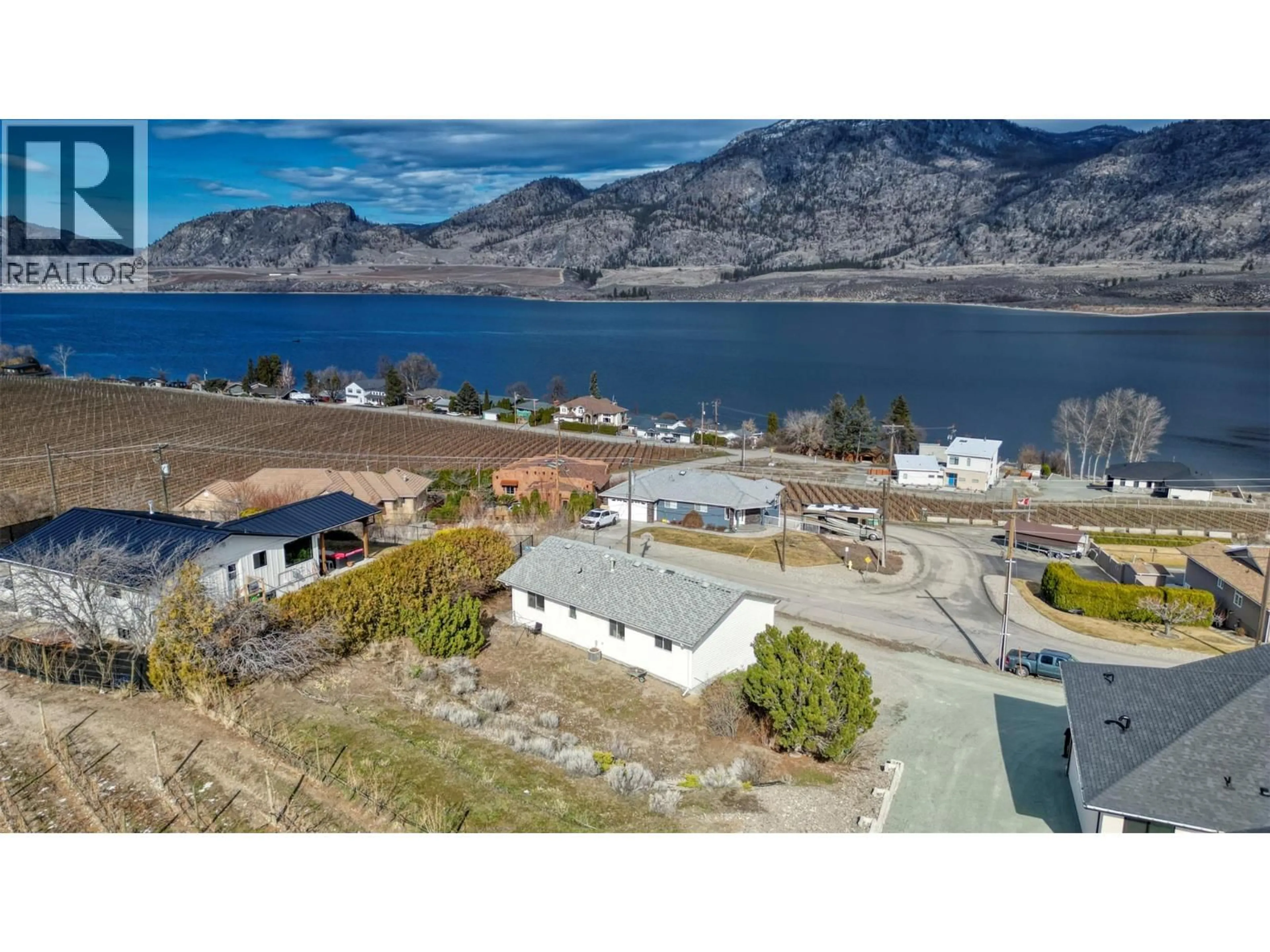 A pic from outside/outdoor area/front of a property/back of a property/a pic from drone, water/lake/river/ocean view for 10408 87TH STREET, Osoyoos British Columbia V0H1V2