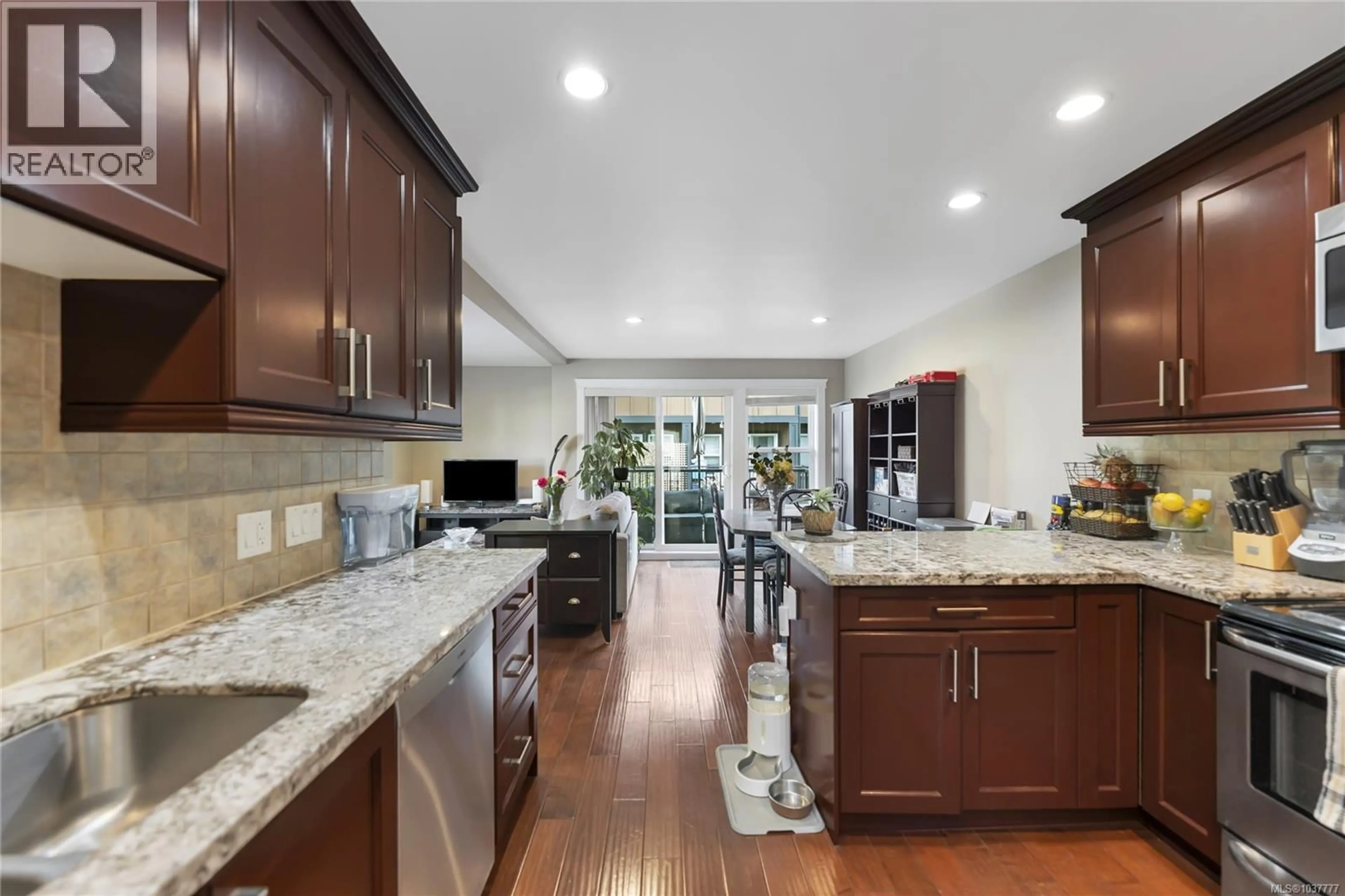 Open concept kitchen, ceramic/tile floor for 101 - 982 RATTANWOOD PLACE, Langford British Columbia V9C0C7