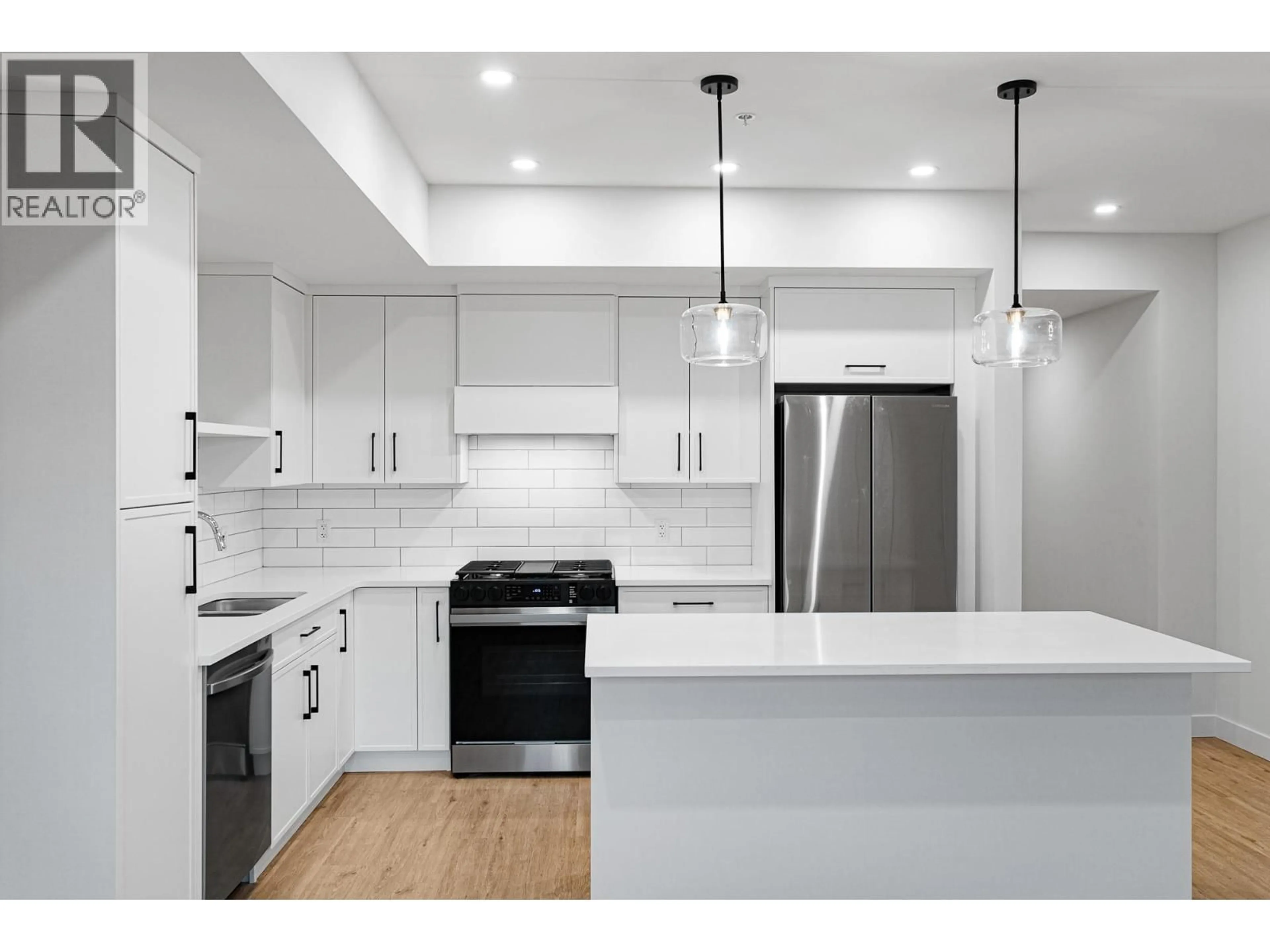 Open concept kitchen, unknown for 103 - 1844 QU'APPELLE BOULEVARD, Kamloops British Columbia V2E0E8