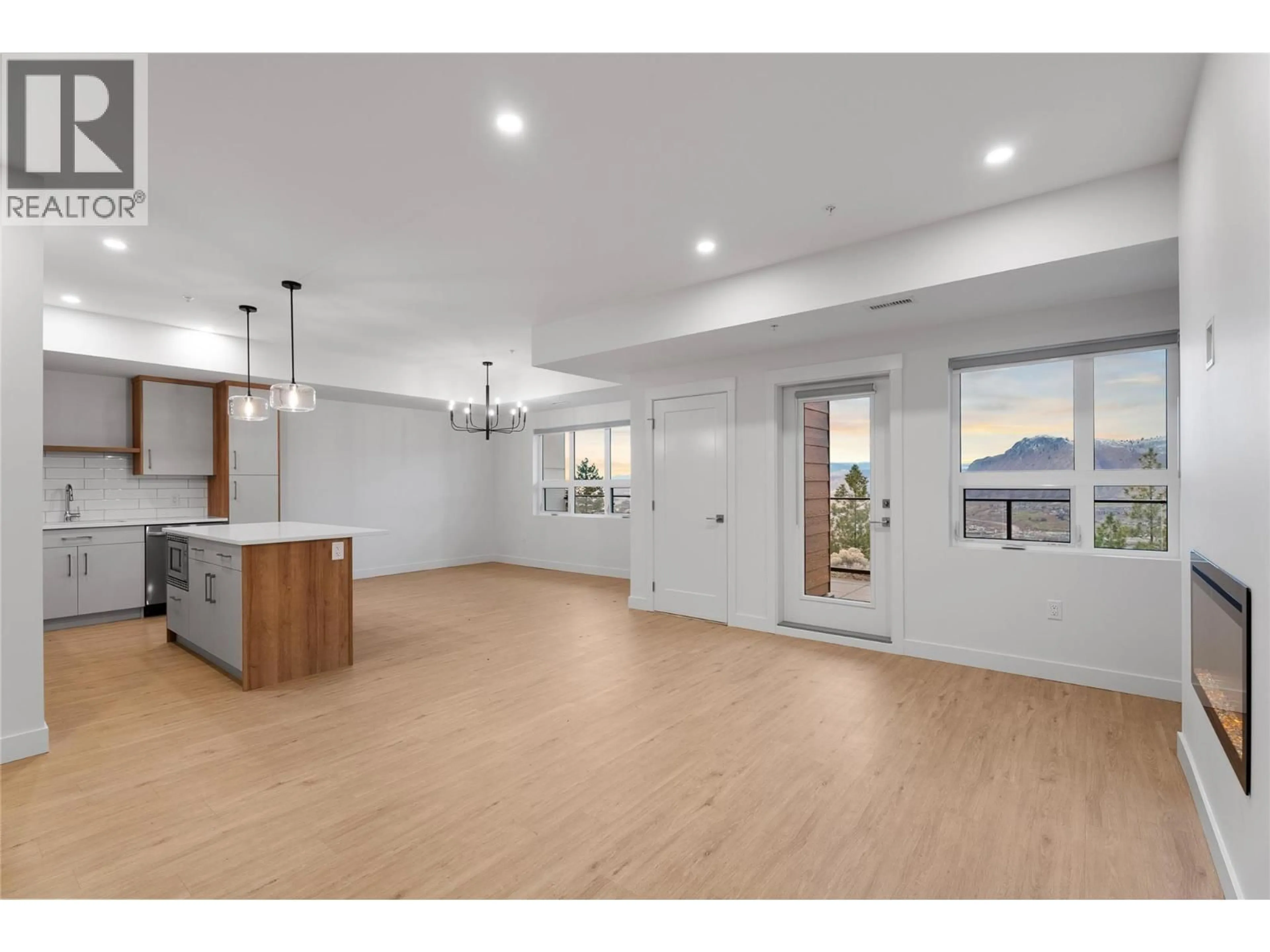 Open concept kitchen, wood/laminate floor for 107 - 1844 QU'APPELLE BOULEVARD, Kamloops British Columbia V2E0E8