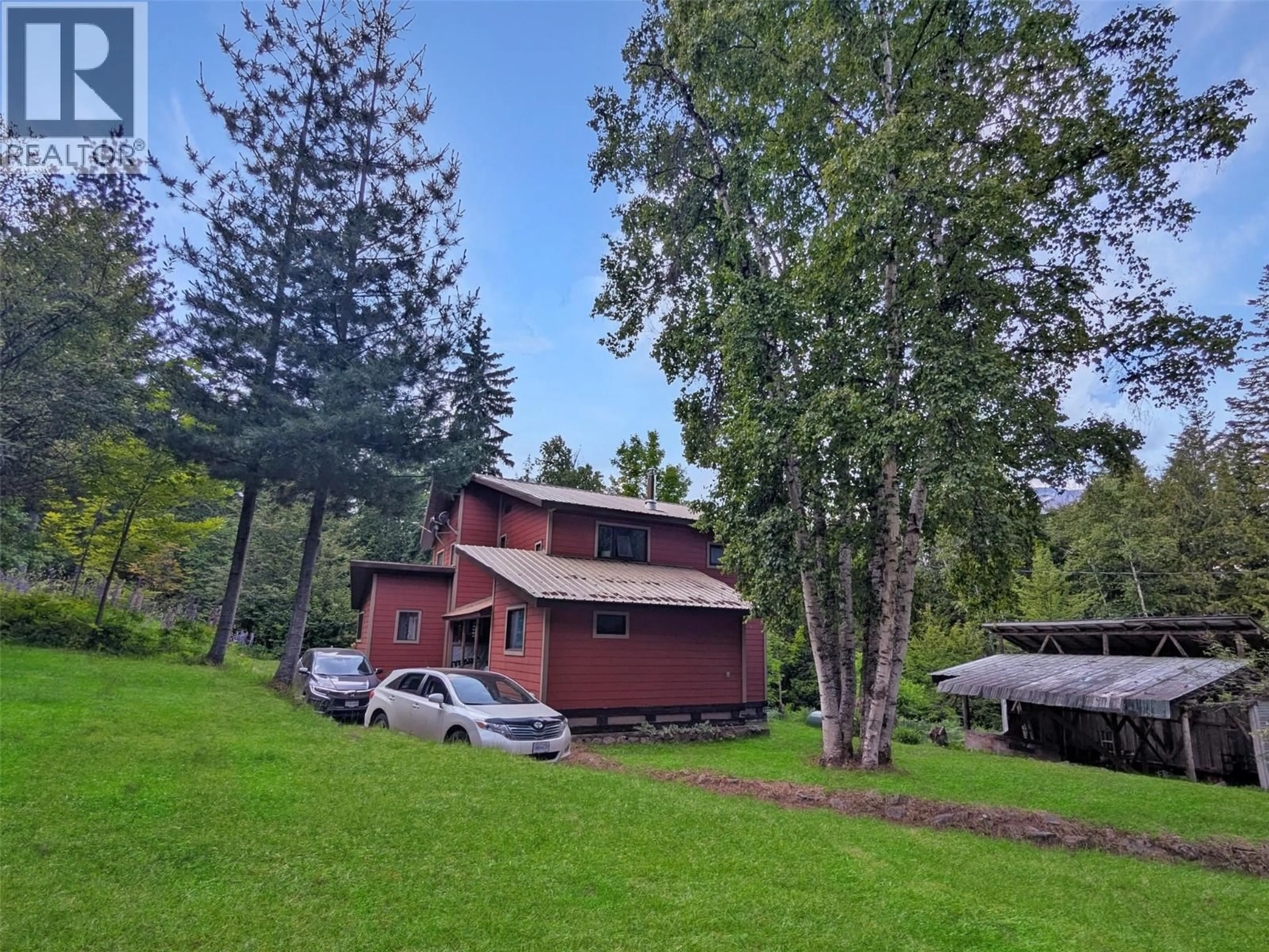 A pic from outside/outdoor area/front of a property/back of a property/a pic from drone, forest/trees view for 8802 MARTENS ROAD, Slocan British Columbia V0G2C0