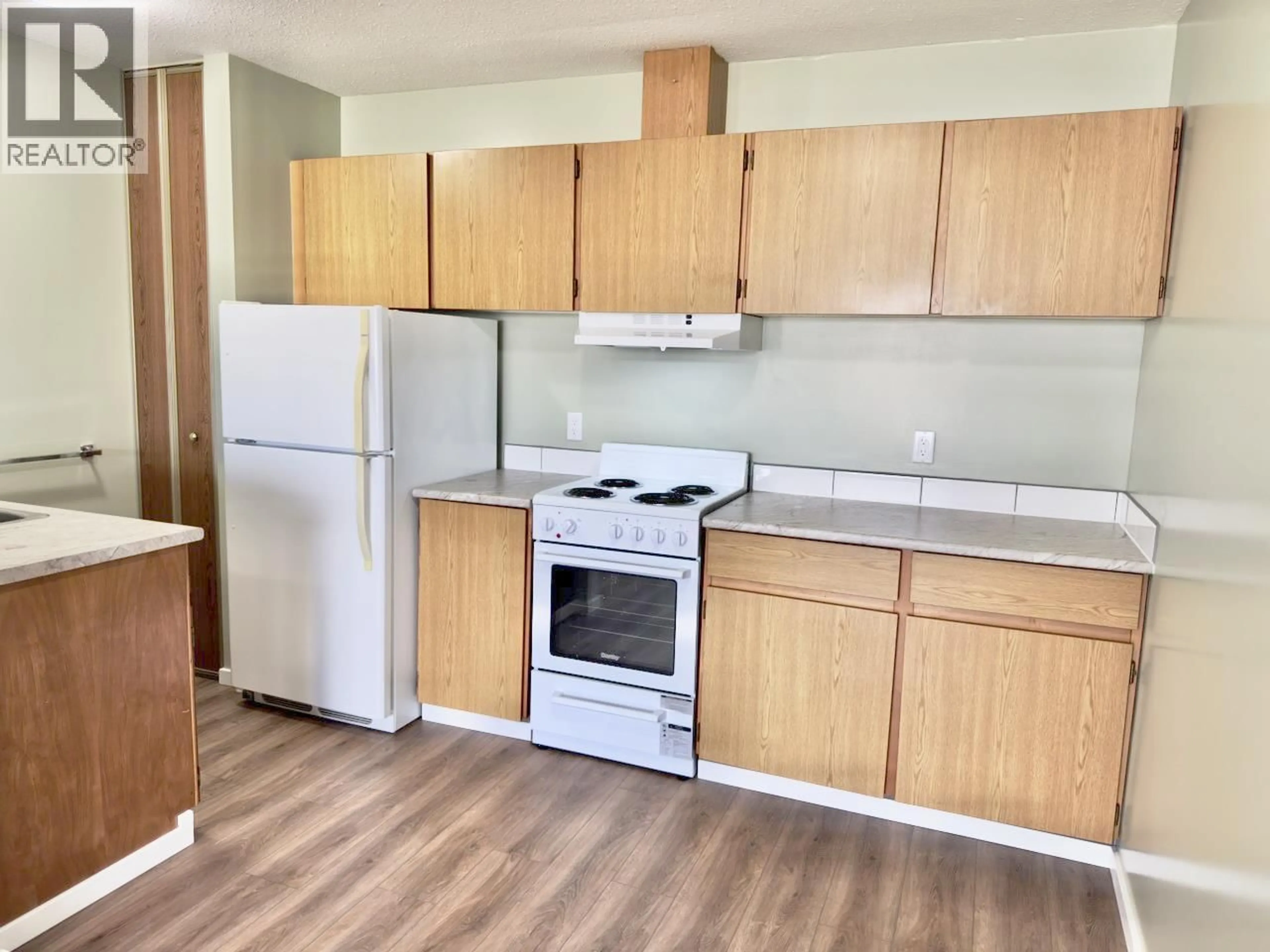 Standard kitchen, wood/laminate floor for 2 - 5852 AIRPORT STREET, Oliver British Columbia V0H1T0