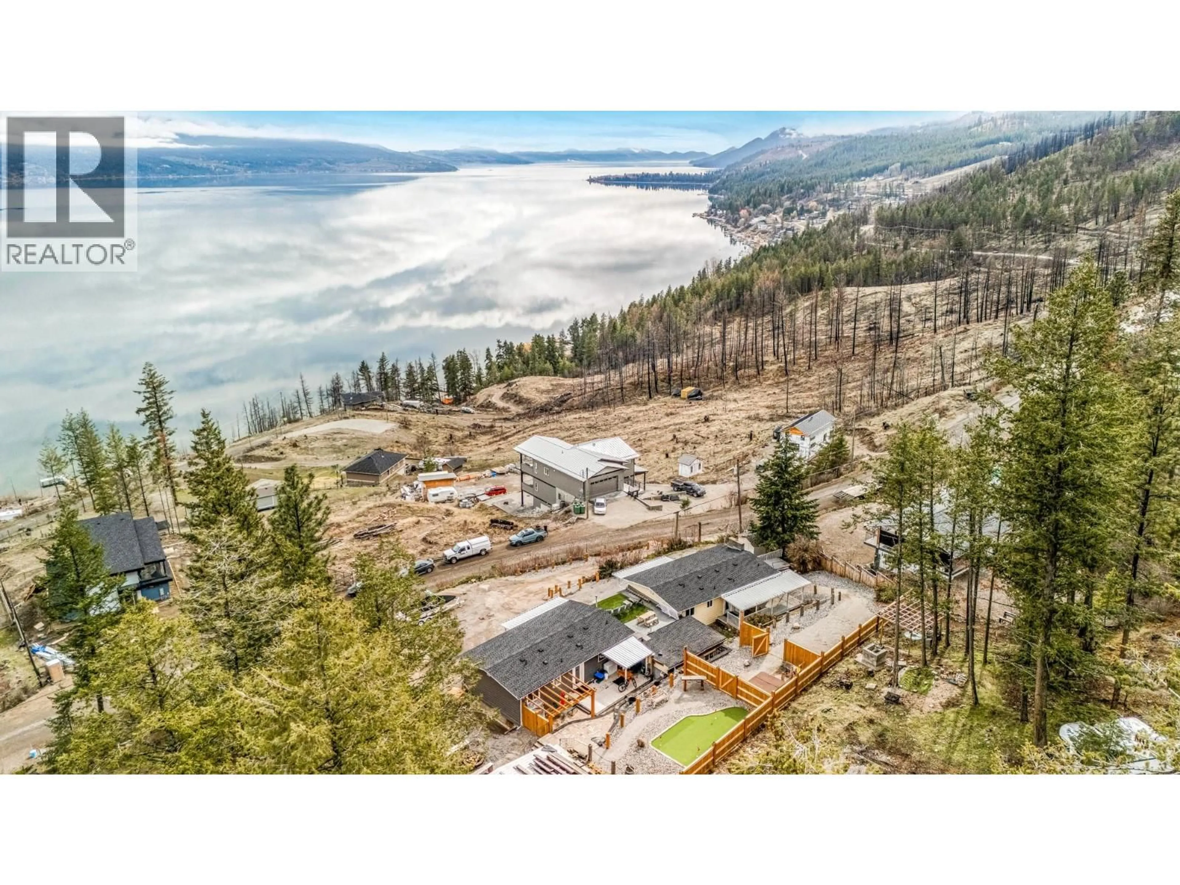 A pic from outside/outdoor area/front of a property/back of a property/a pic from drone, mountain view for 494 KILLARNEY WAY, Vernon British Columbia V1H2C6