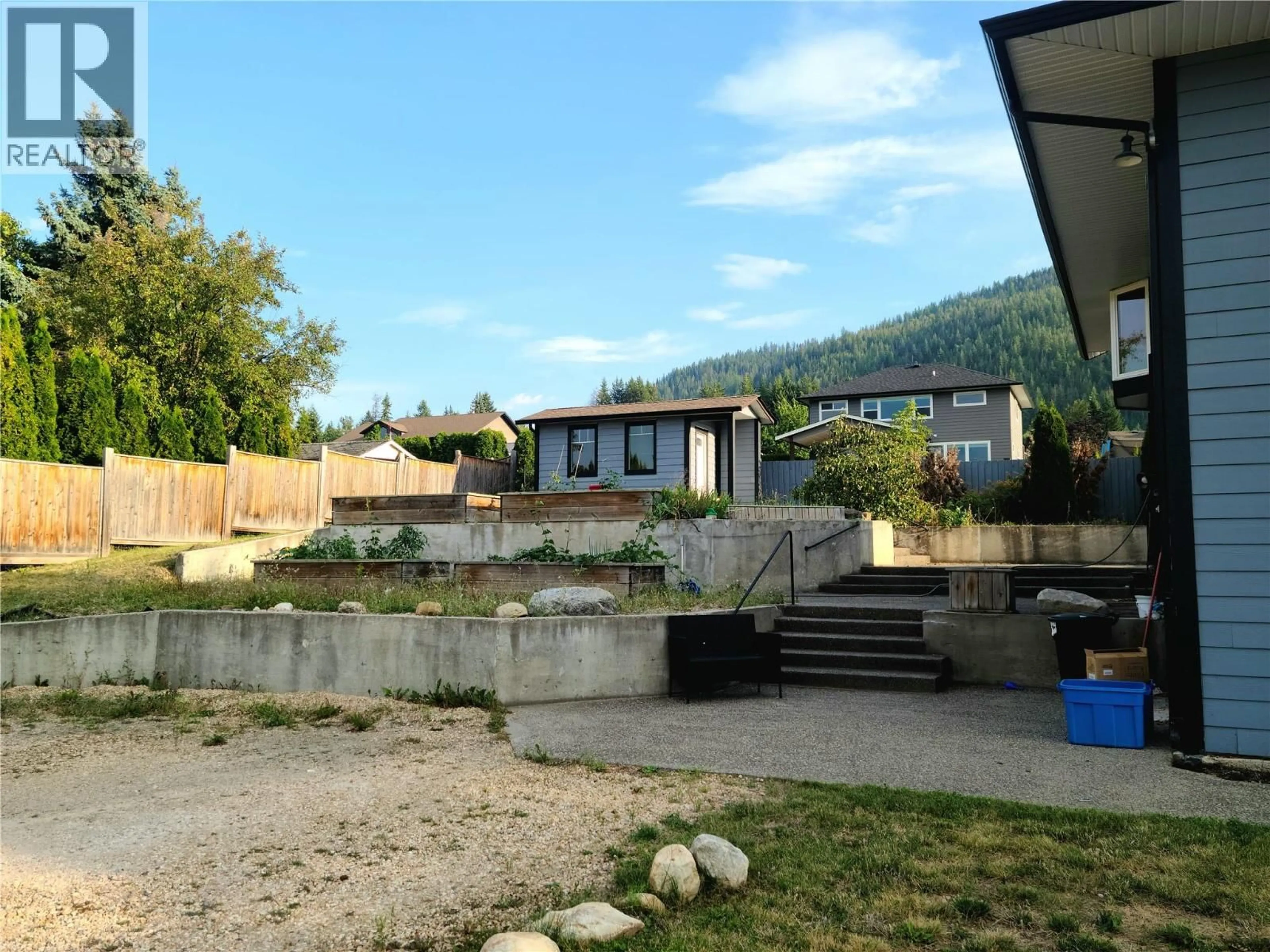 A pic from outside/outdoor area/front of a property/back of a property/a pic from drone, mountain view for 1350 13 AVENUE SOUTHEAST, Salmon Arm British Columbia V1E2G7
