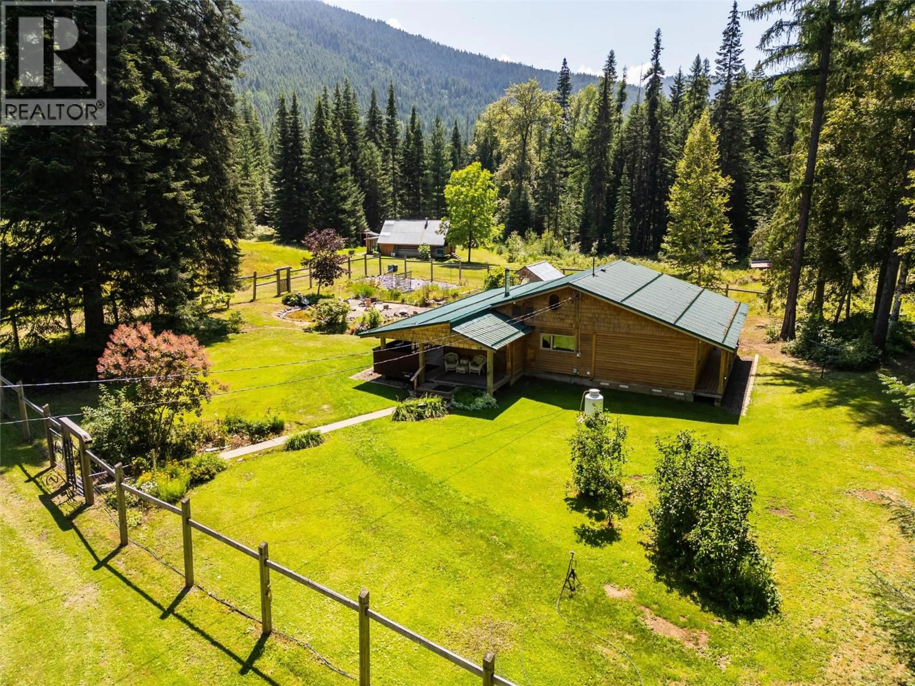 A pic from outside/outdoor area/front of a property/back of a property/a pic from drone, mountain view for 541 BEAR ROAD, Salmo British Columbia V0G1Z0