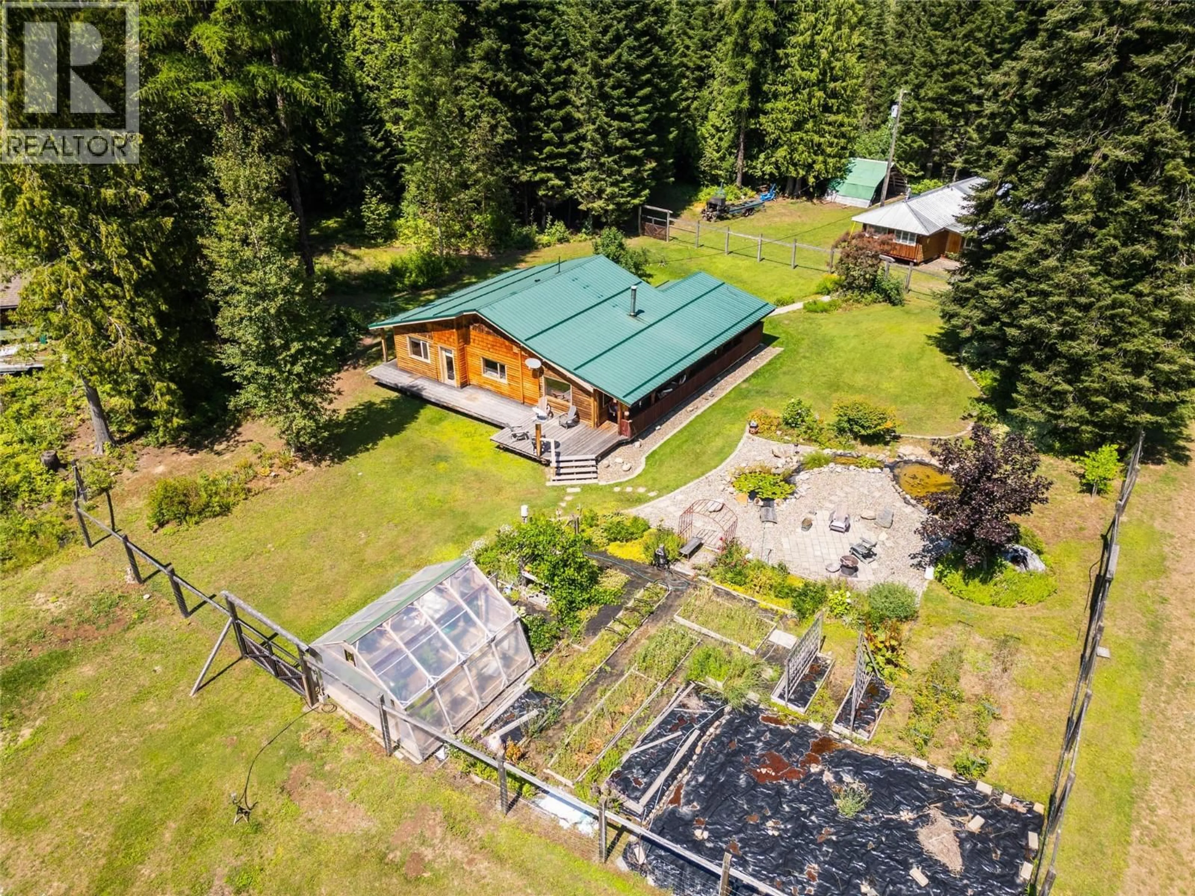 A pic from outside/outdoor area/front of a property/back of a property/a pic from drone, unknown for 541 BEAR ROAD, Salmo British Columbia V0G1Z0