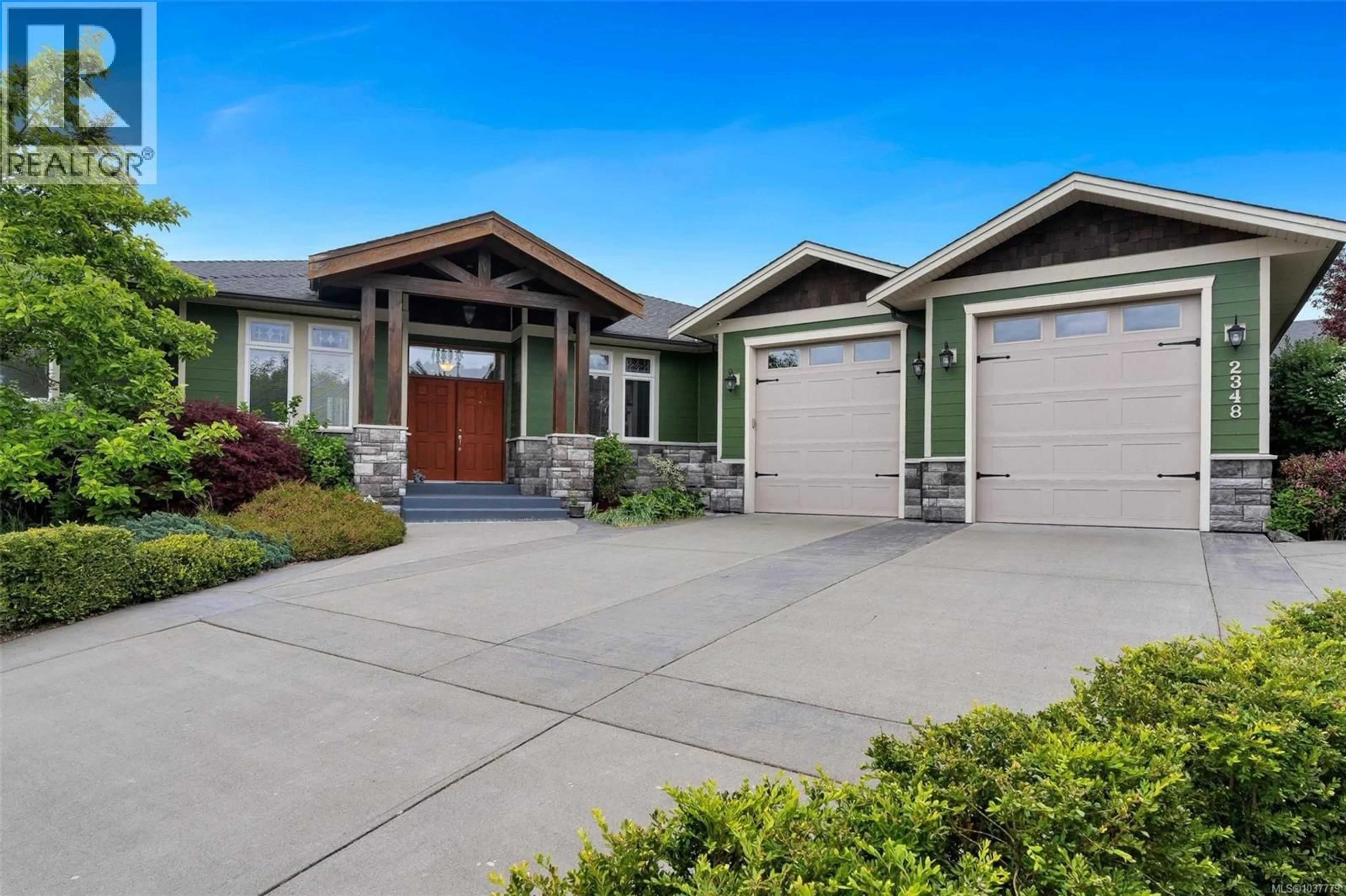 Home with vinyl exterior material, street for 2348 COOPERS HAWK RISE, Mill Bay British Columbia V8H1H7