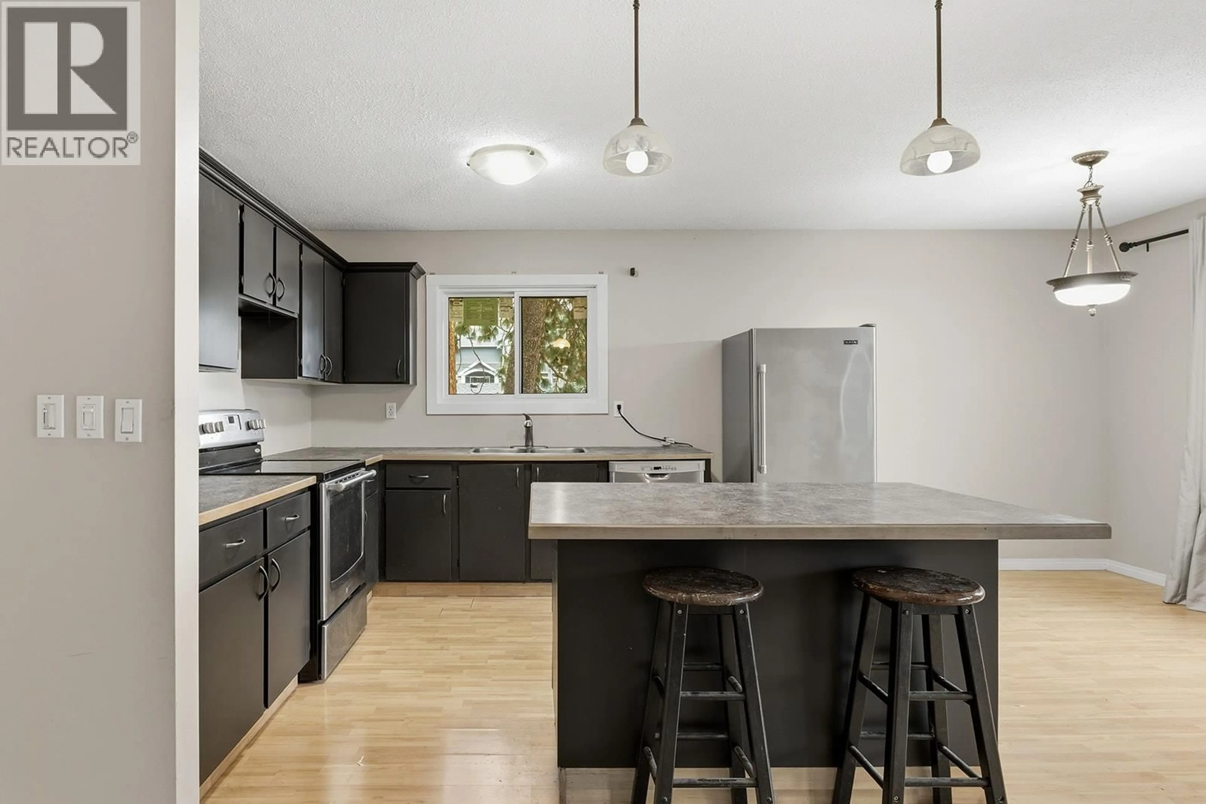 Open concept kitchen, unknown for 5187 CHUTE LAKE CRESCENT, Kelowna British Columbia V1W4L7