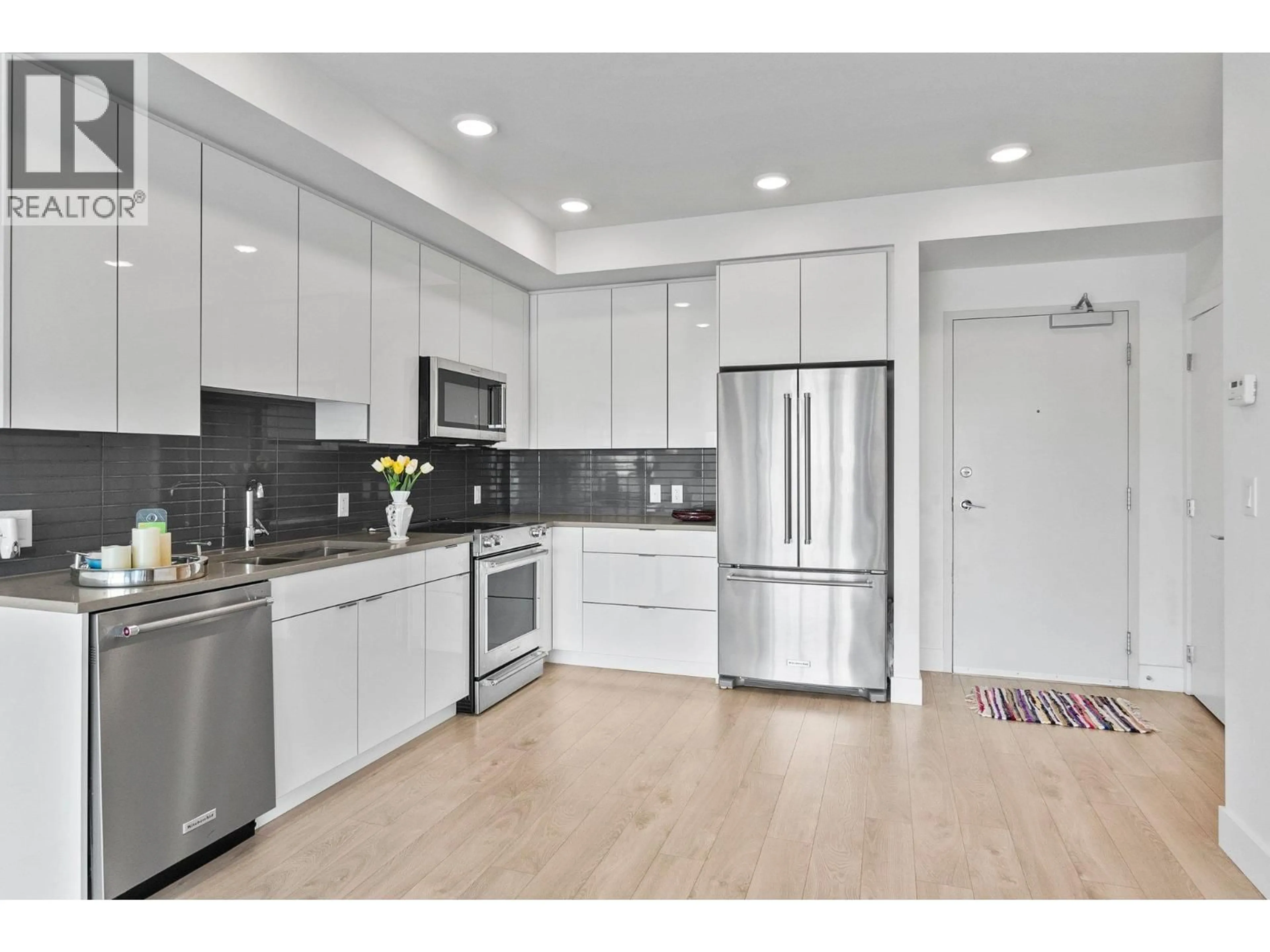 Open concept kitchen, unknown for 506 - 1232 ELLIS STREET, Kelowna British Columbia V1Y0J6