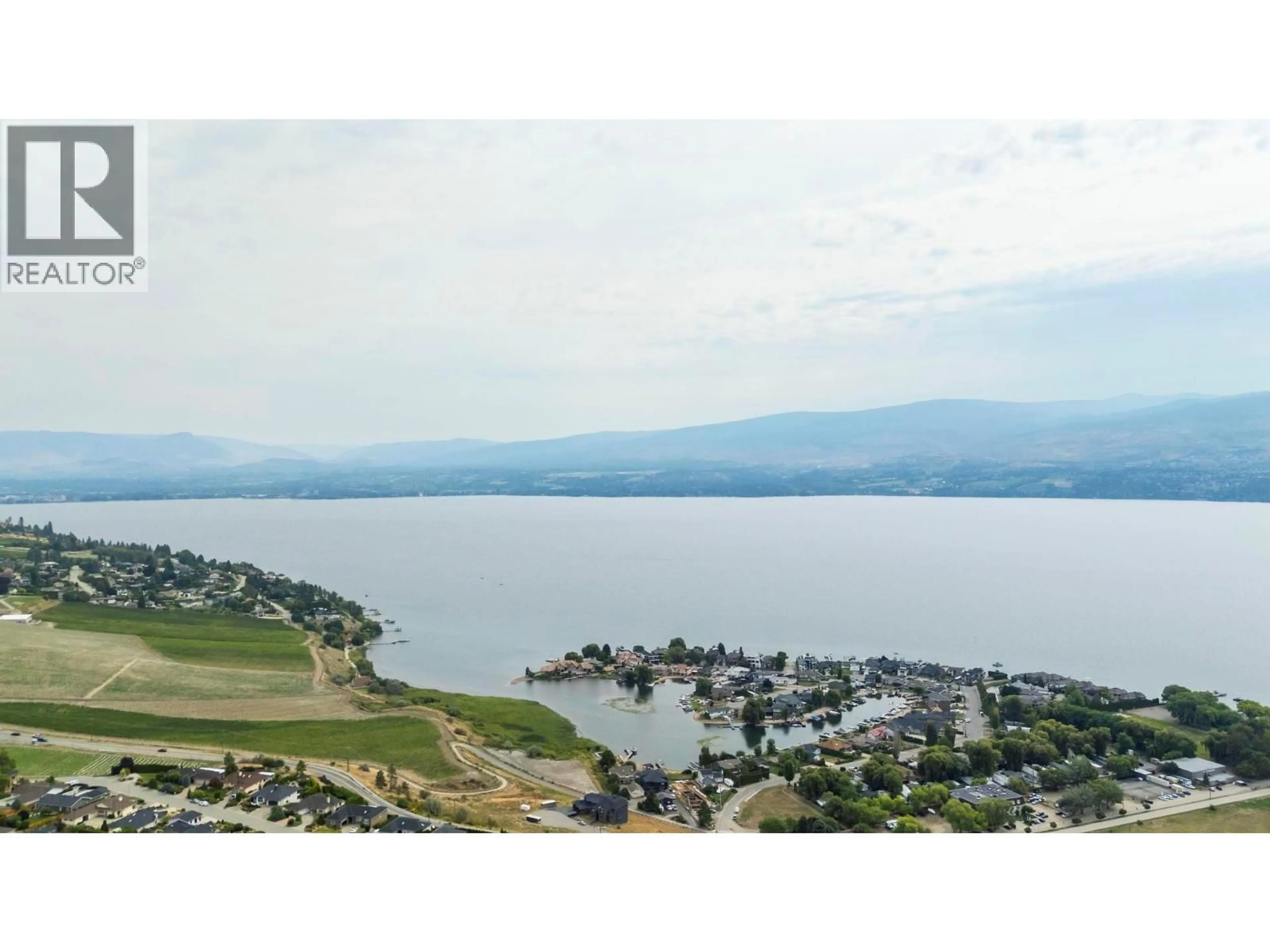A pic from outside/outdoor area/front of a property/back of a property/a pic from drone, water/lake/river/ocean view for 1569 GREGORY ROAD, West Kelowna British Columbia V4T2V7