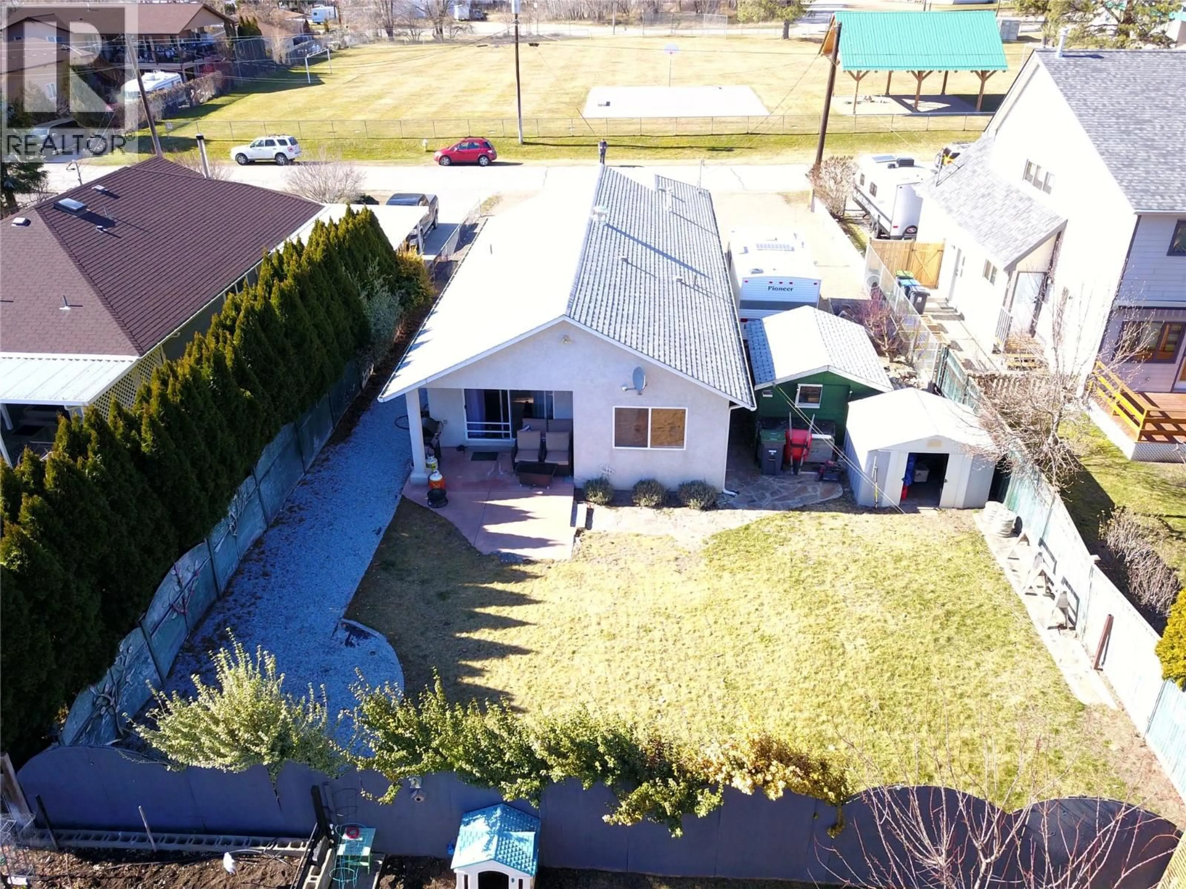A pic from outside/outdoor area/front of a property/back of a property/a pic from drone, street for 1225 ASH STREET, Okanagan Falls British Columbia V0H1R0