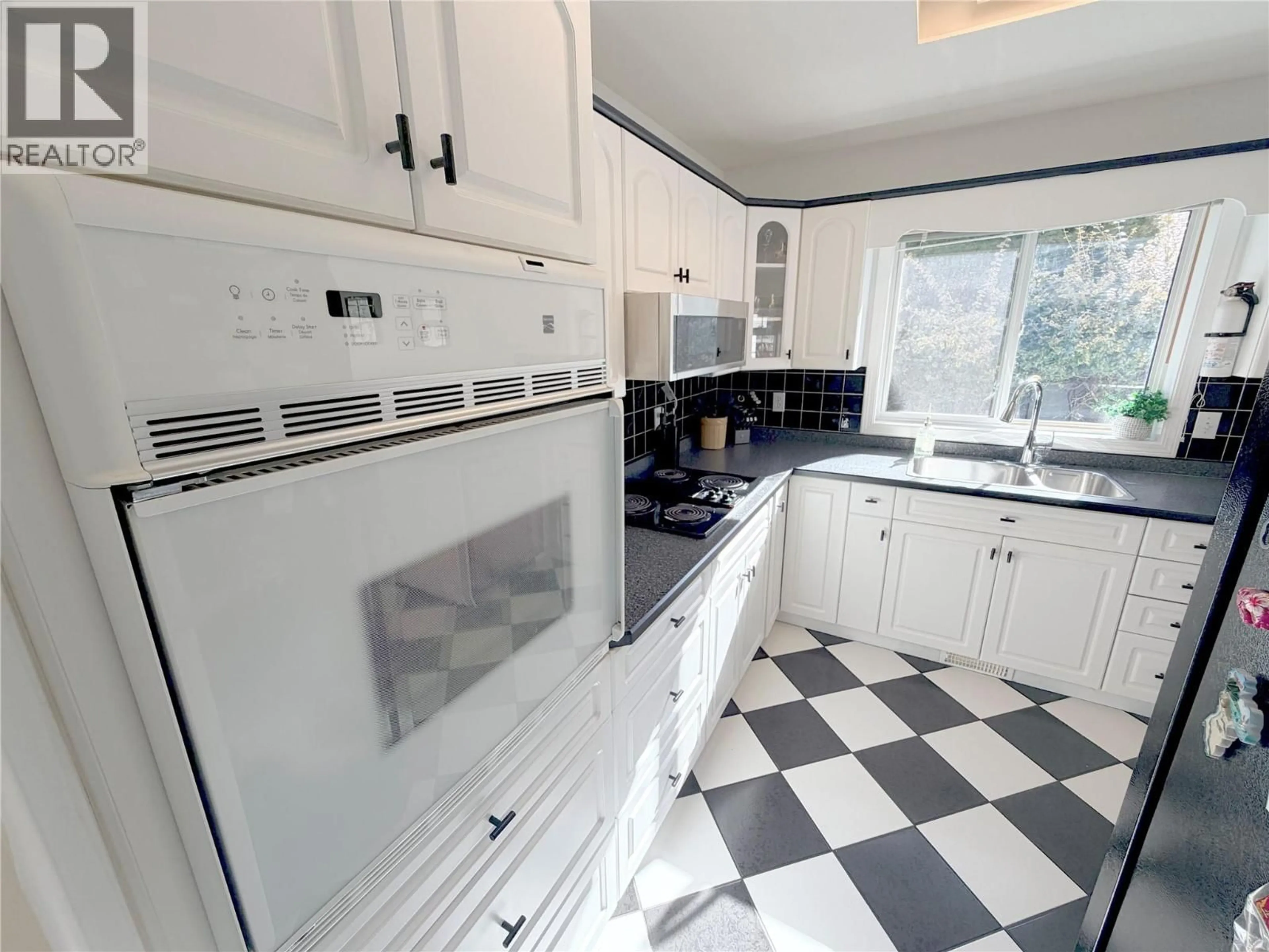 Standard kitchen, ceramic/tile floor for 1225 ASH STREET, Okanagan Falls British Columbia V0H1R0