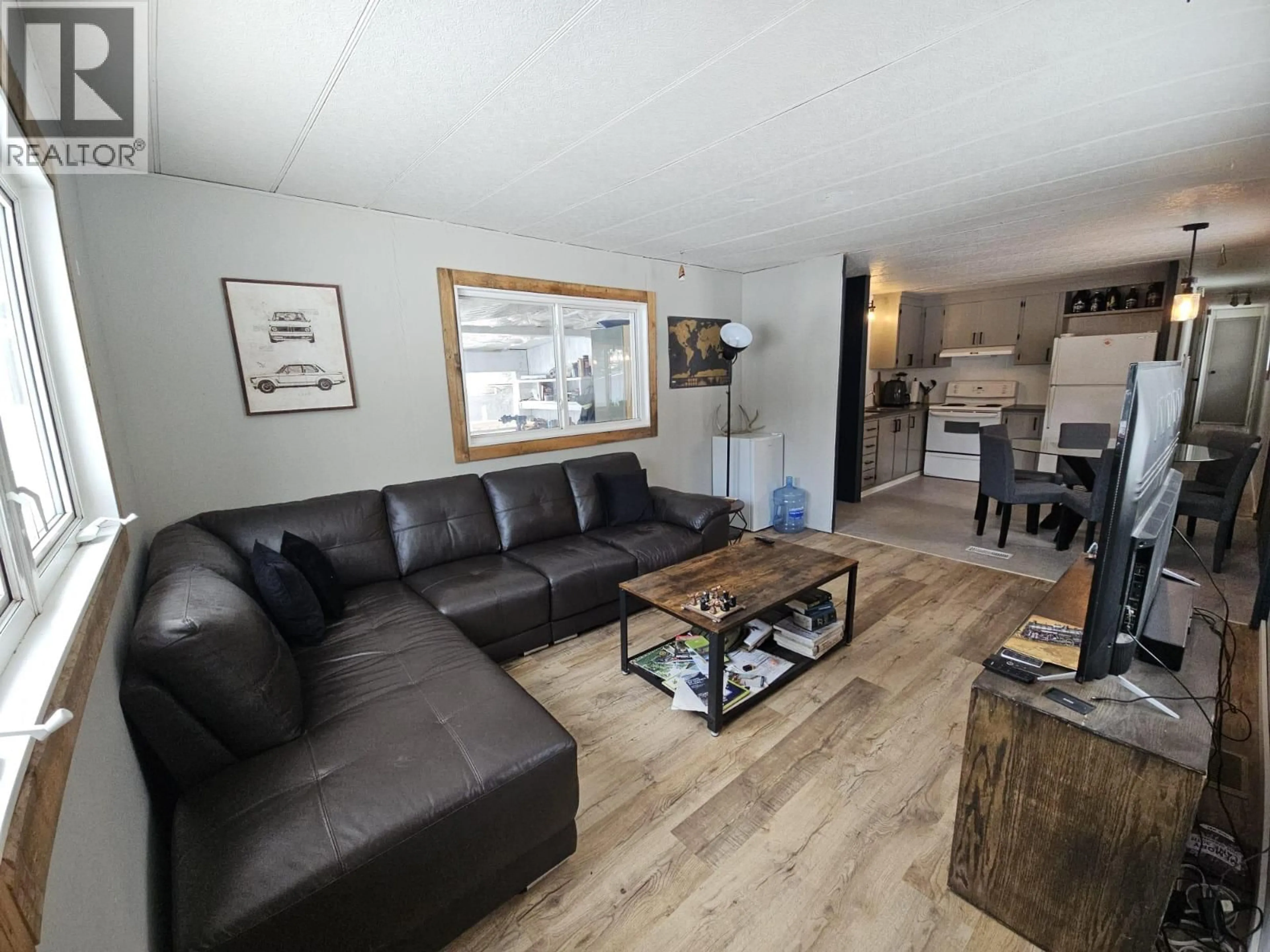Living room with furniture, wood/laminate floor for 6379 WILDMARE OTHER, Chetwynd British Columbia V0C1J0