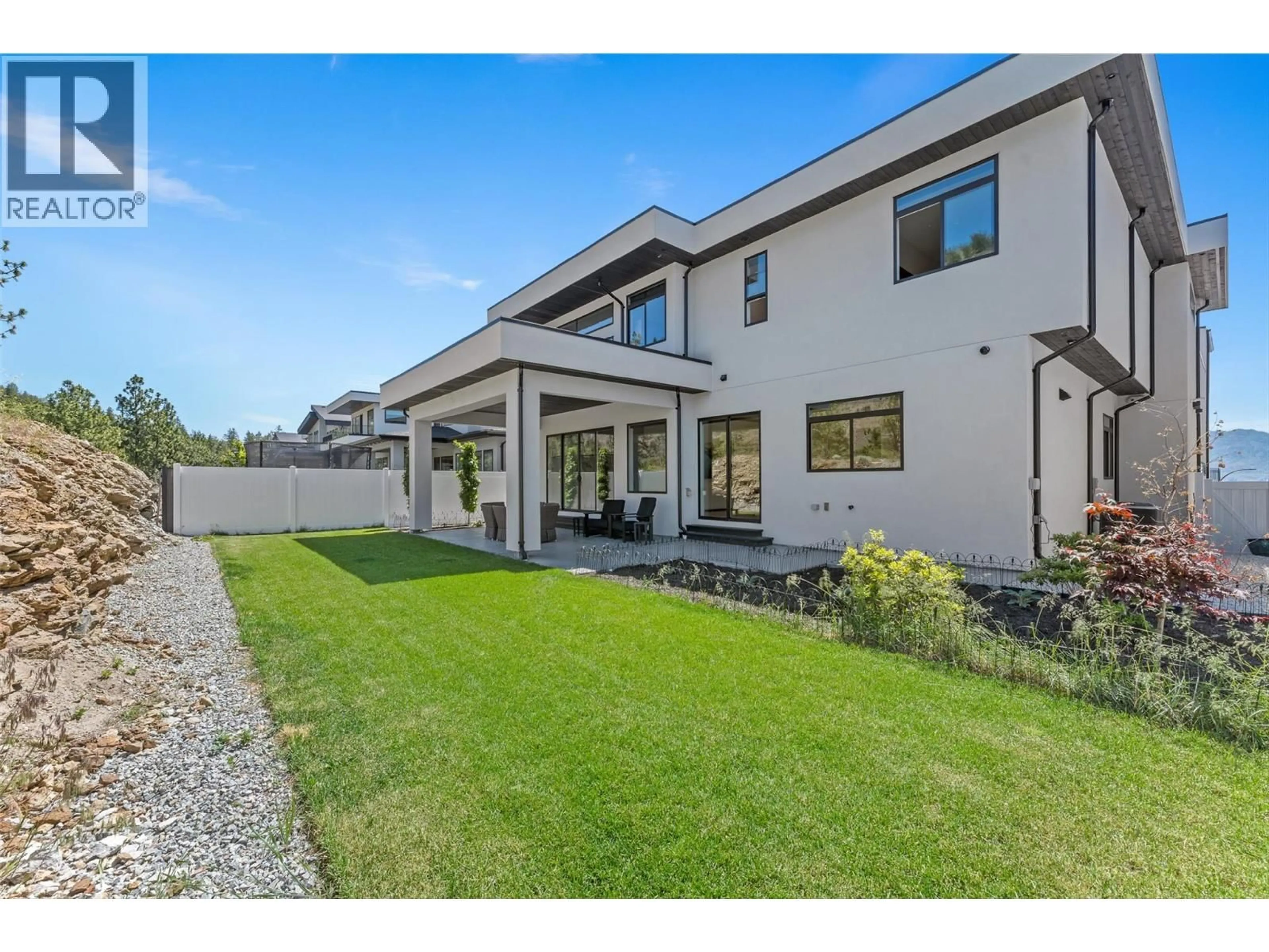 A pic from outside/outdoor area/front of a property/back of a property/a pic from drone, street for 1556 CABERNET WAY, West Kelowna British Columbia V4T0E1