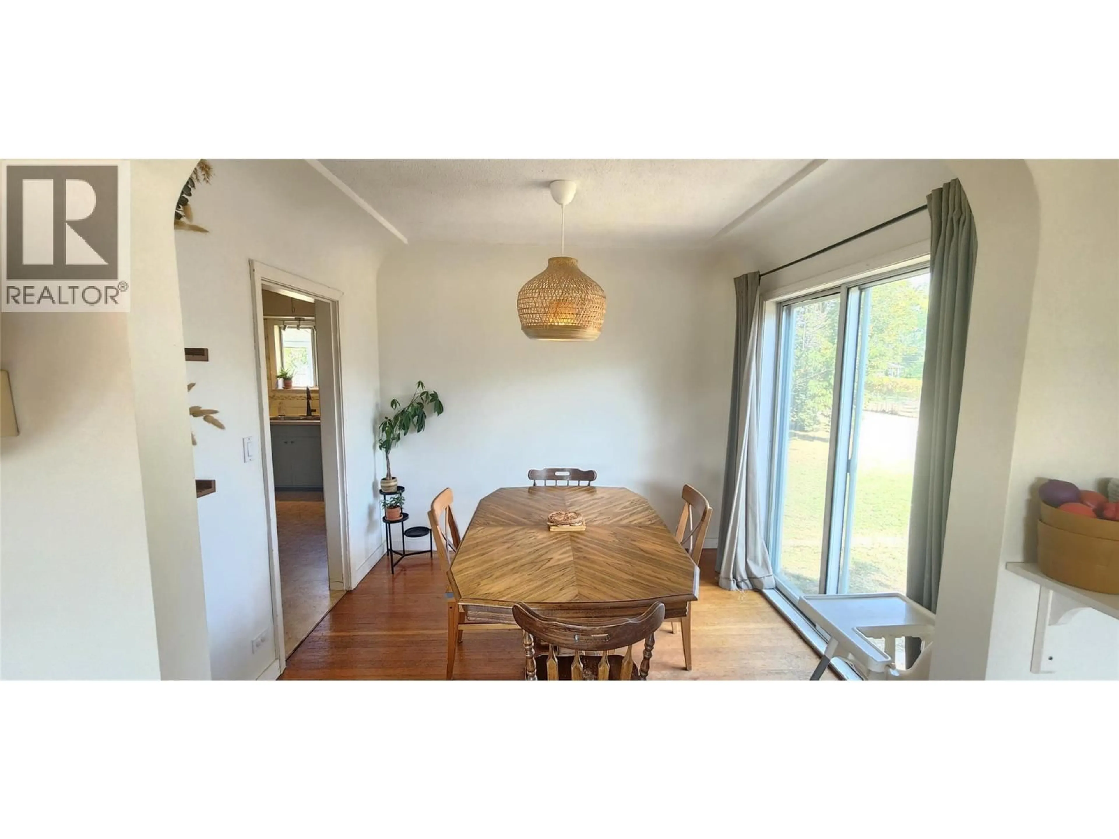 Dining room, wood/laminate floor for 4960 VERNON STREET, Grand Forks British Columbia V0H1H5