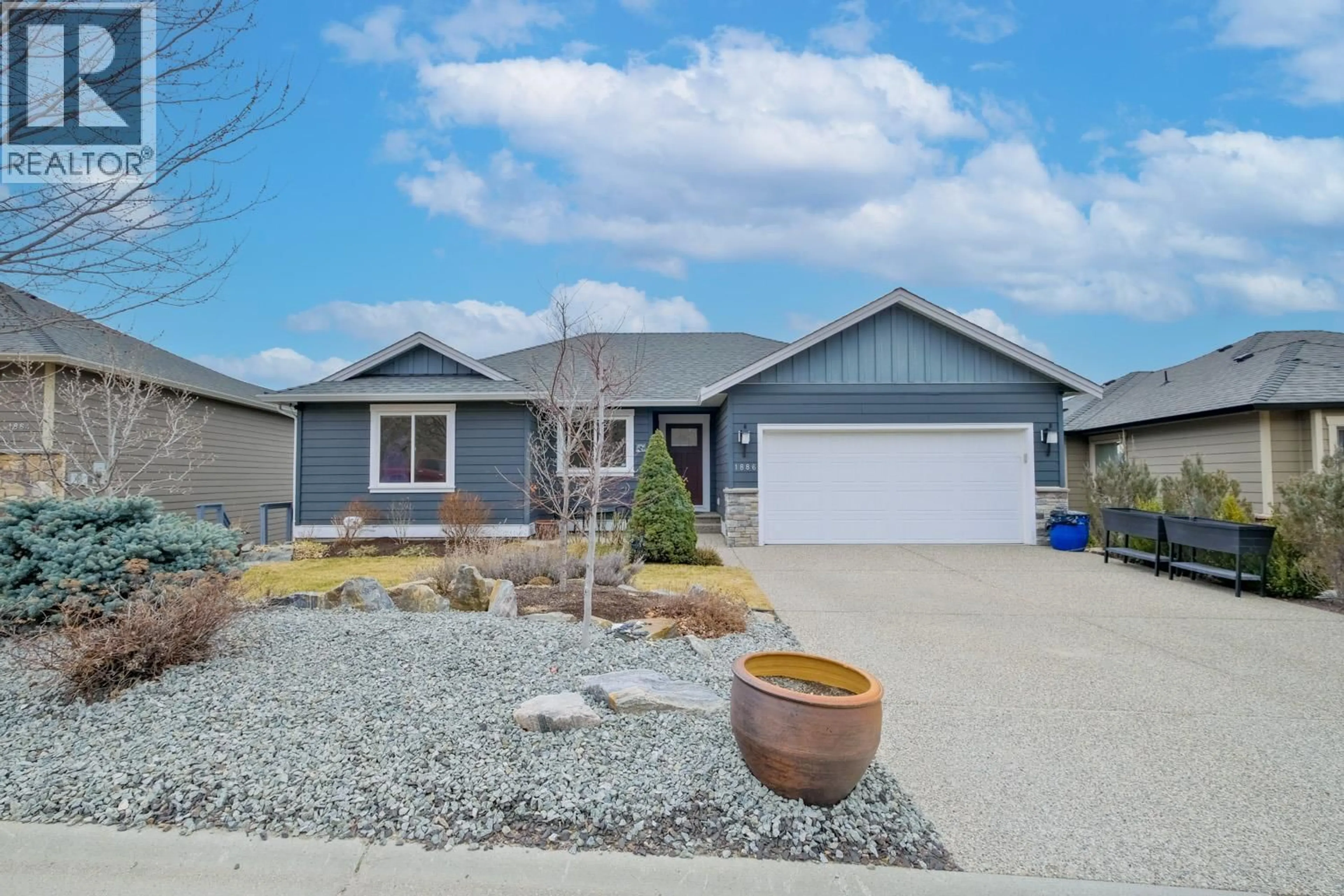 Home with vinyl exterior material, street for 1886 ROSEALEE LANE, West Kelowna British Columbia V1Z4C7