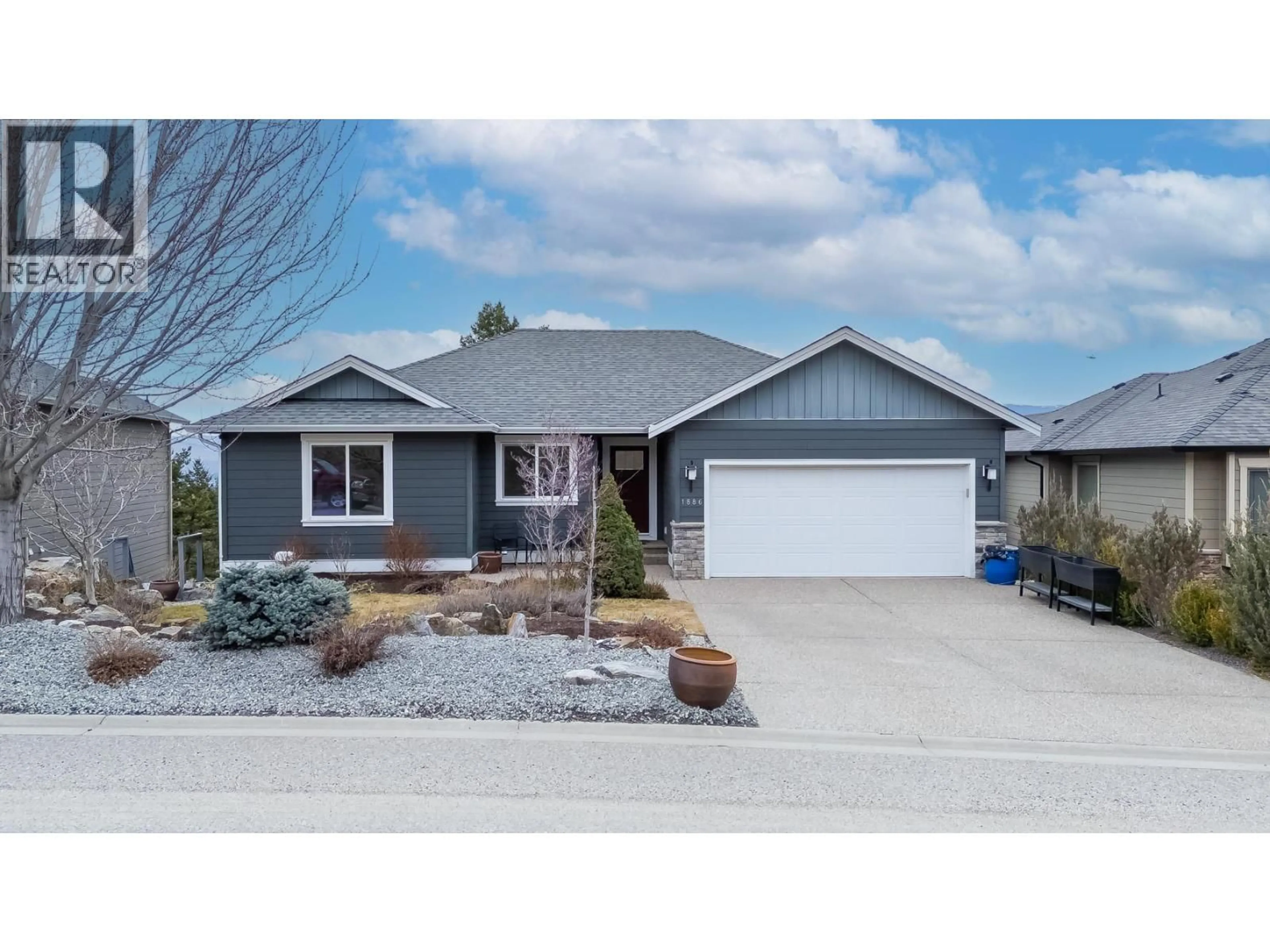 Home with vinyl exterior material, street for 1886 ROSEALEE LANE, West Kelowna British Columbia V1Z4C7