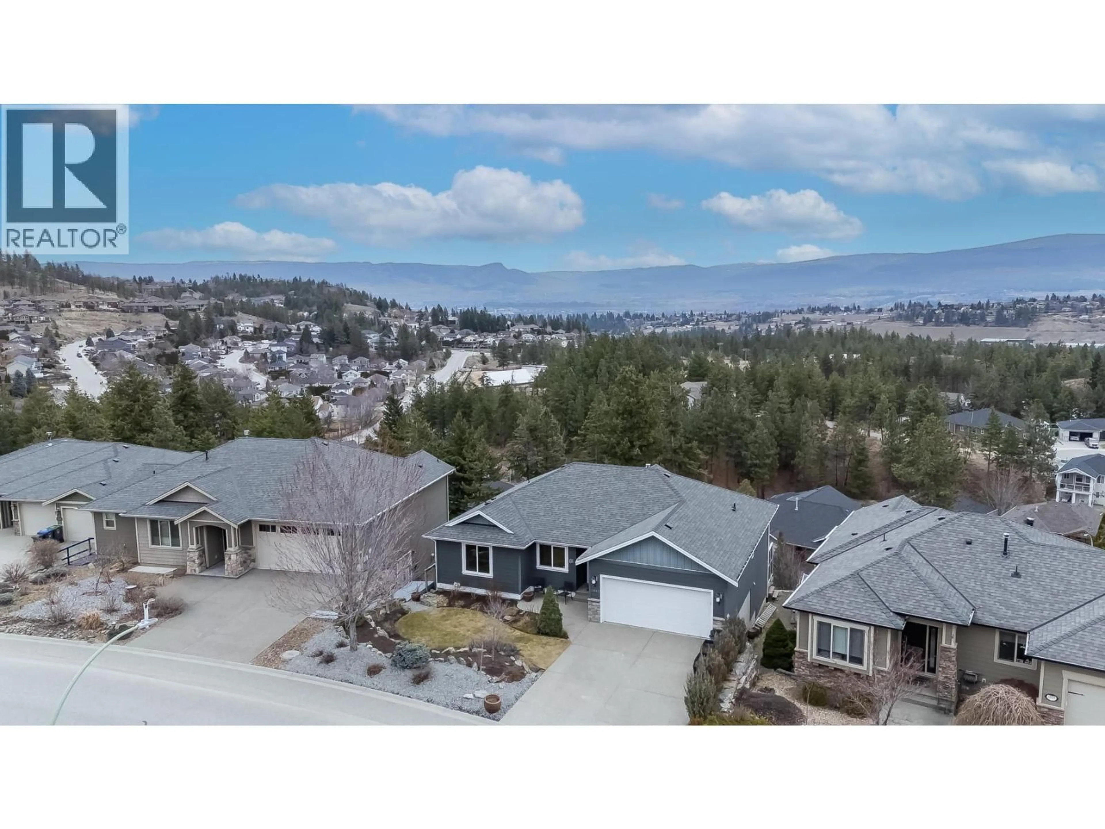 A pic from outside/outdoor area/front of a property/back of a property/a pic from drone, mountain view for 1886 ROSEALEE LANE, West Kelowna British Columbia V1Z4C7